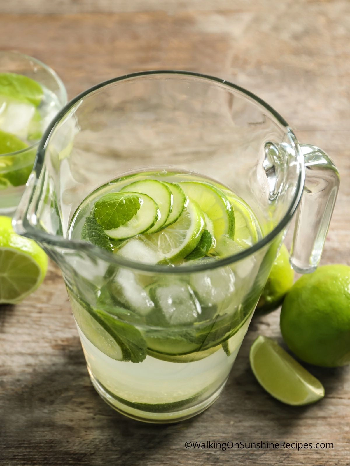 pitcher with water and fresh lime slices. 