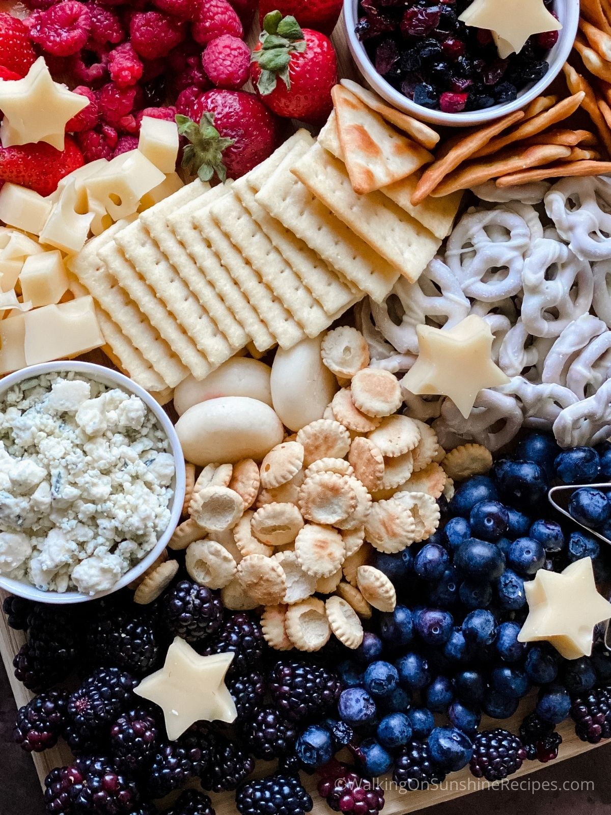 crackers, fruit and cheeses. 