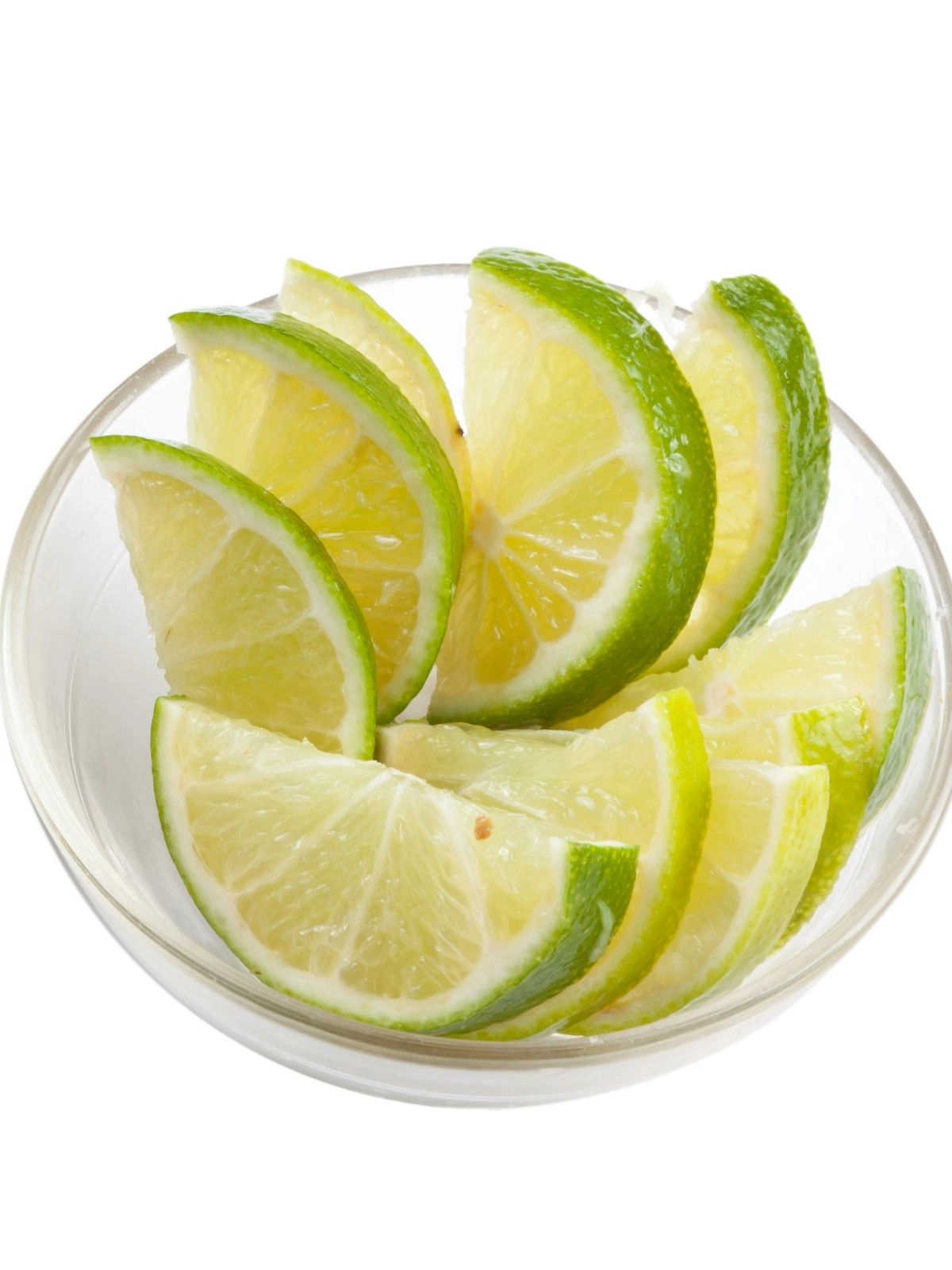 Lime slices in bowl. 