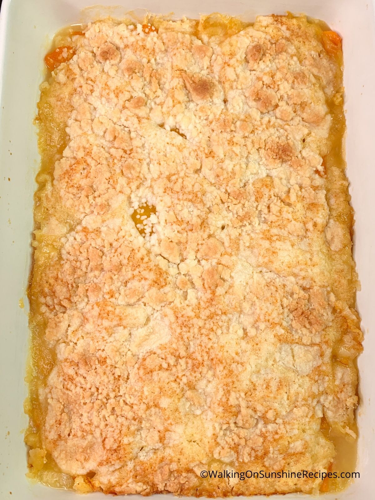 peach cobbler made with white cake mix baked.
