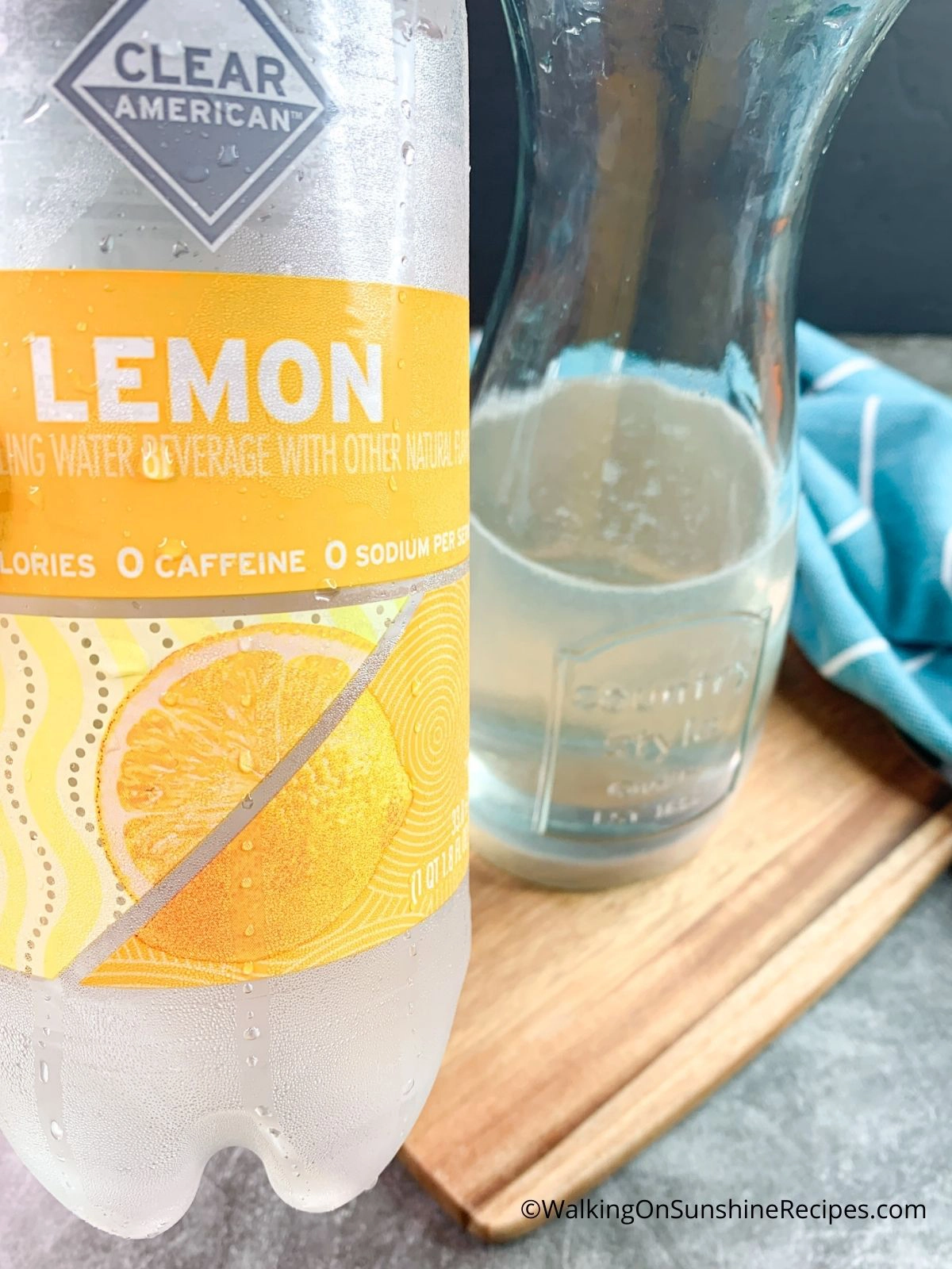 Add Lemon Sparkling Water to pitcher.