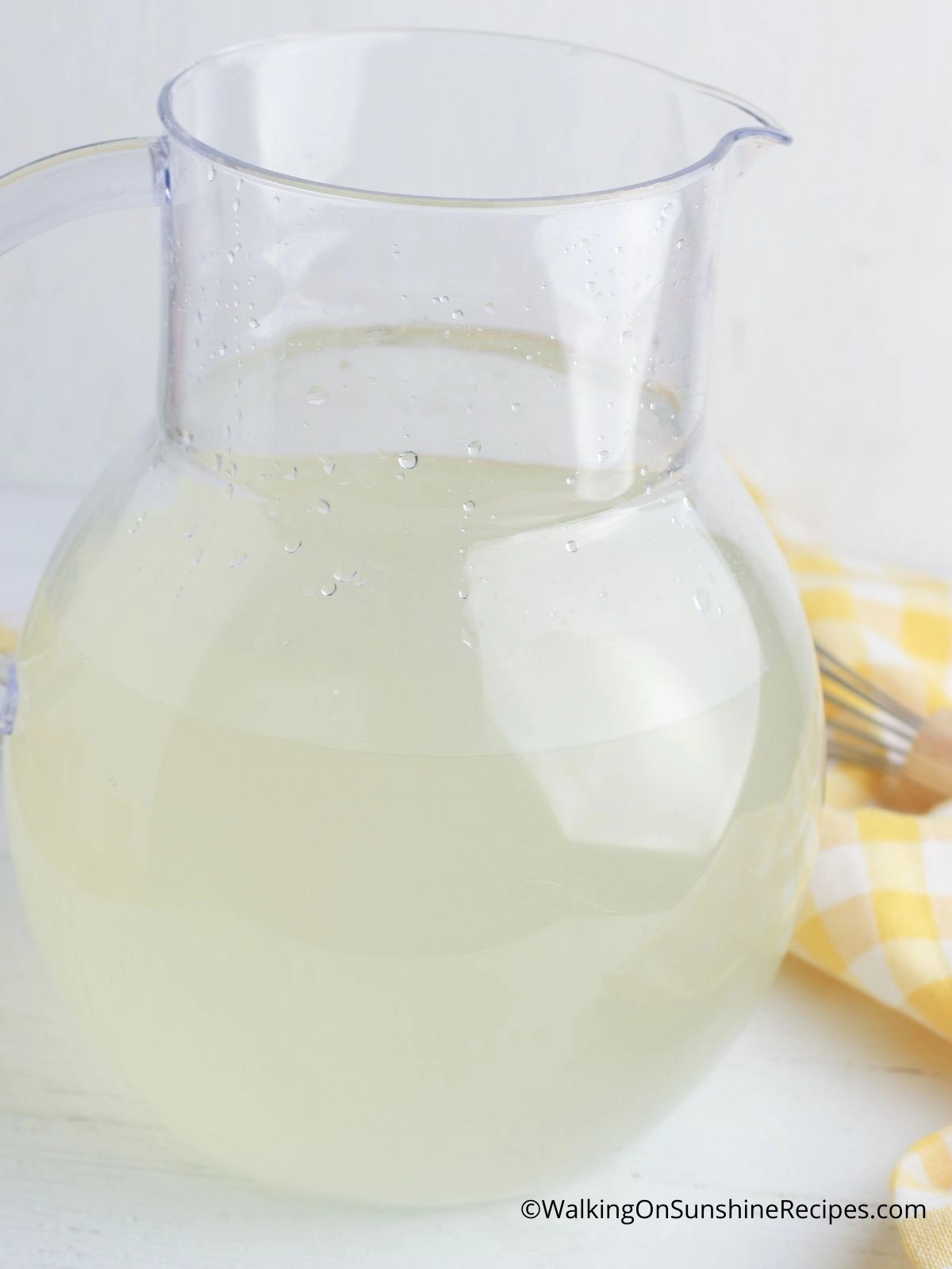 Lemonade in glass pitcher.