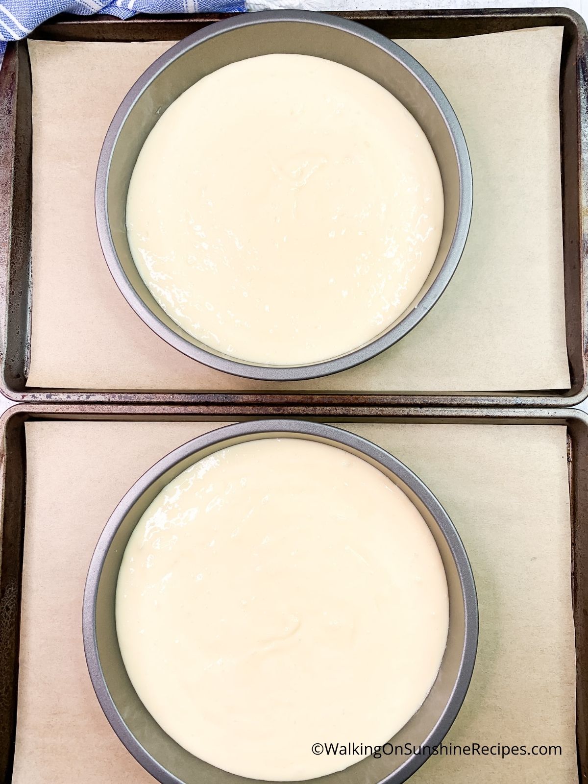 cake batter in pans before baking.