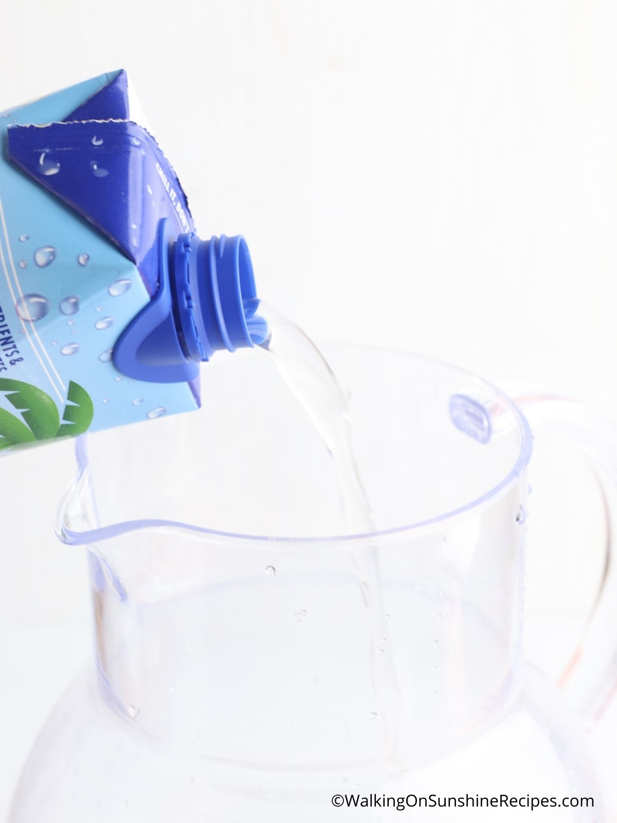 Add coconut water to pitcher.