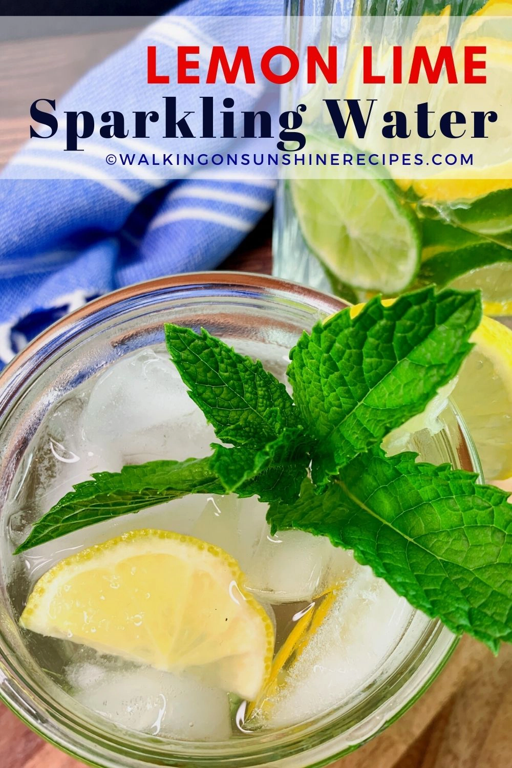 glass of lemon lime sparkling water with sprig of mint. 