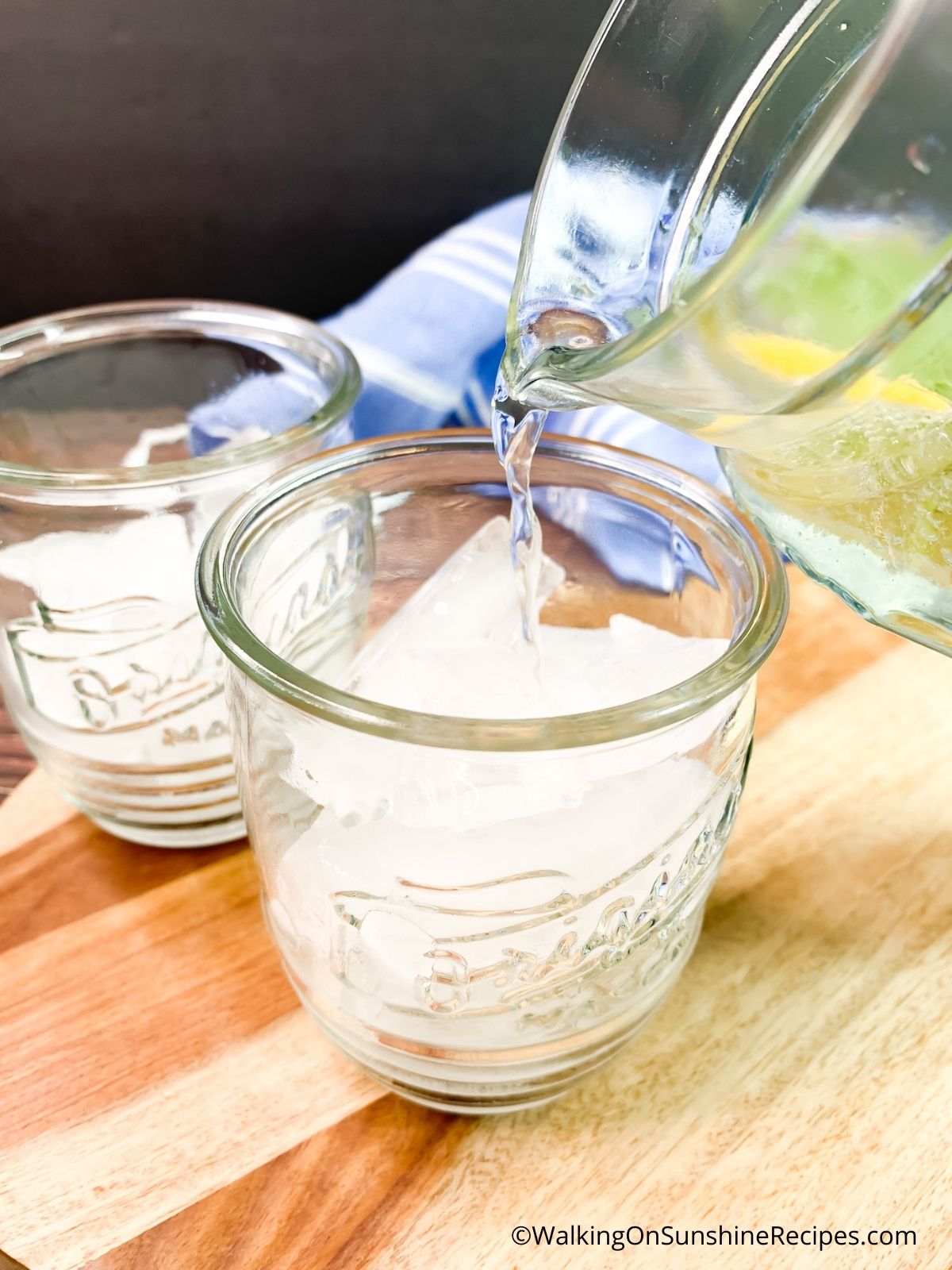 Pouring lemon lime sparkling water.