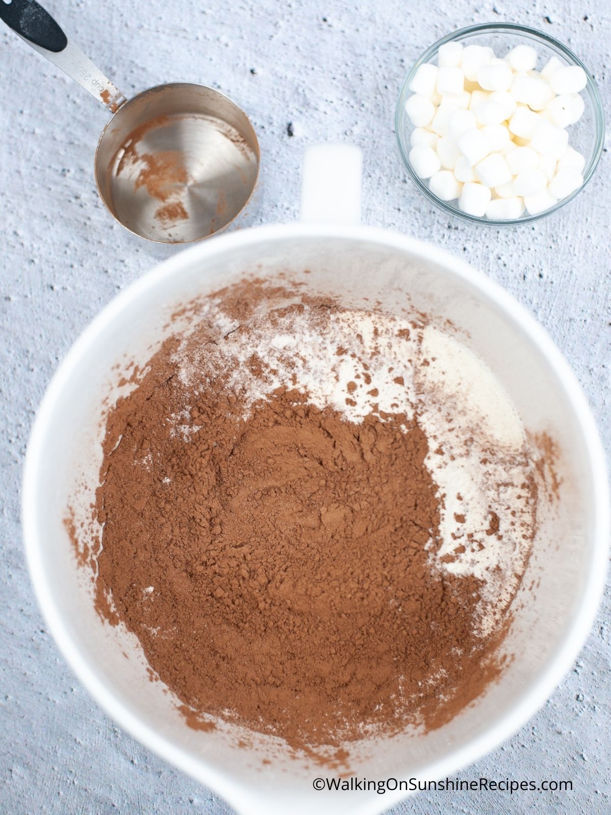 Add Ingredients together for mason jar hot cocoa recipe.