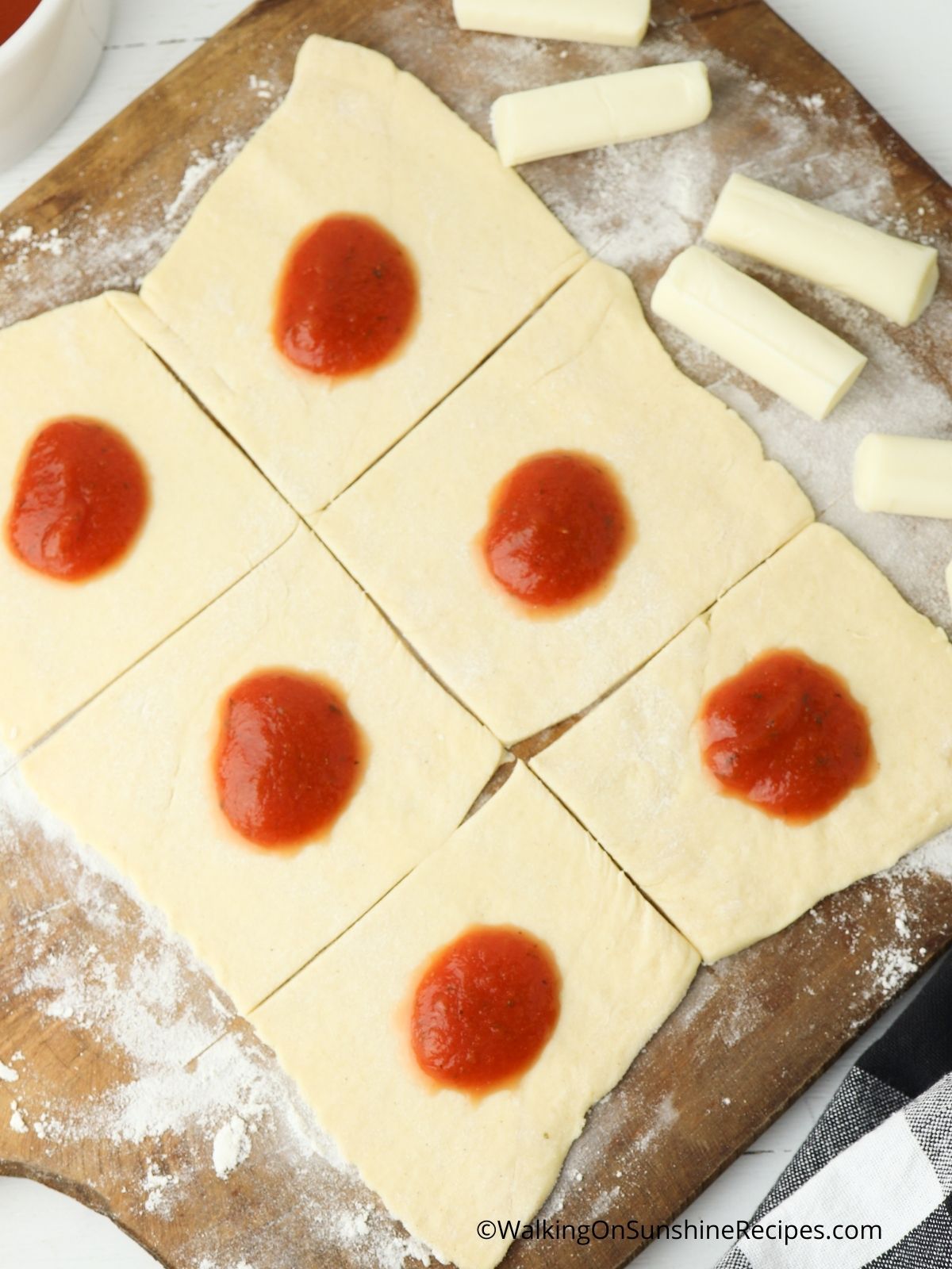 Add marinara sauce to the top.