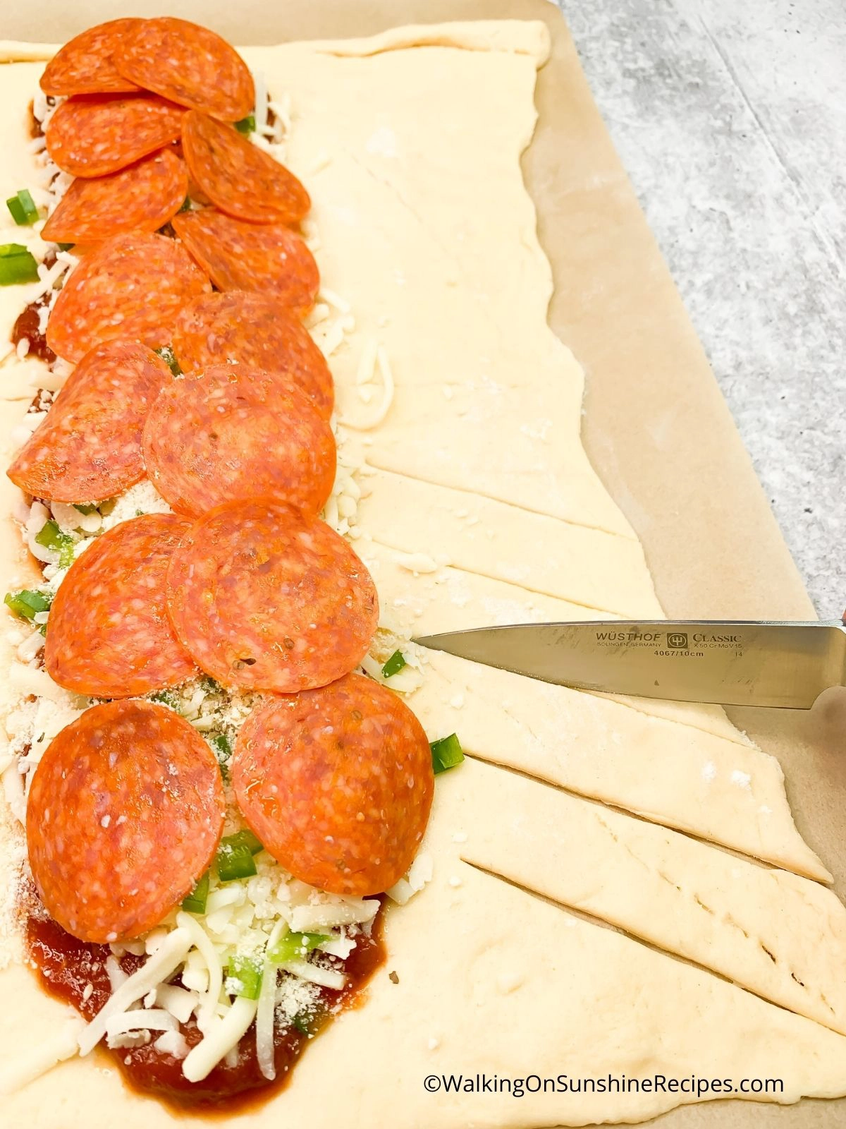 Make slices in crescent dough.