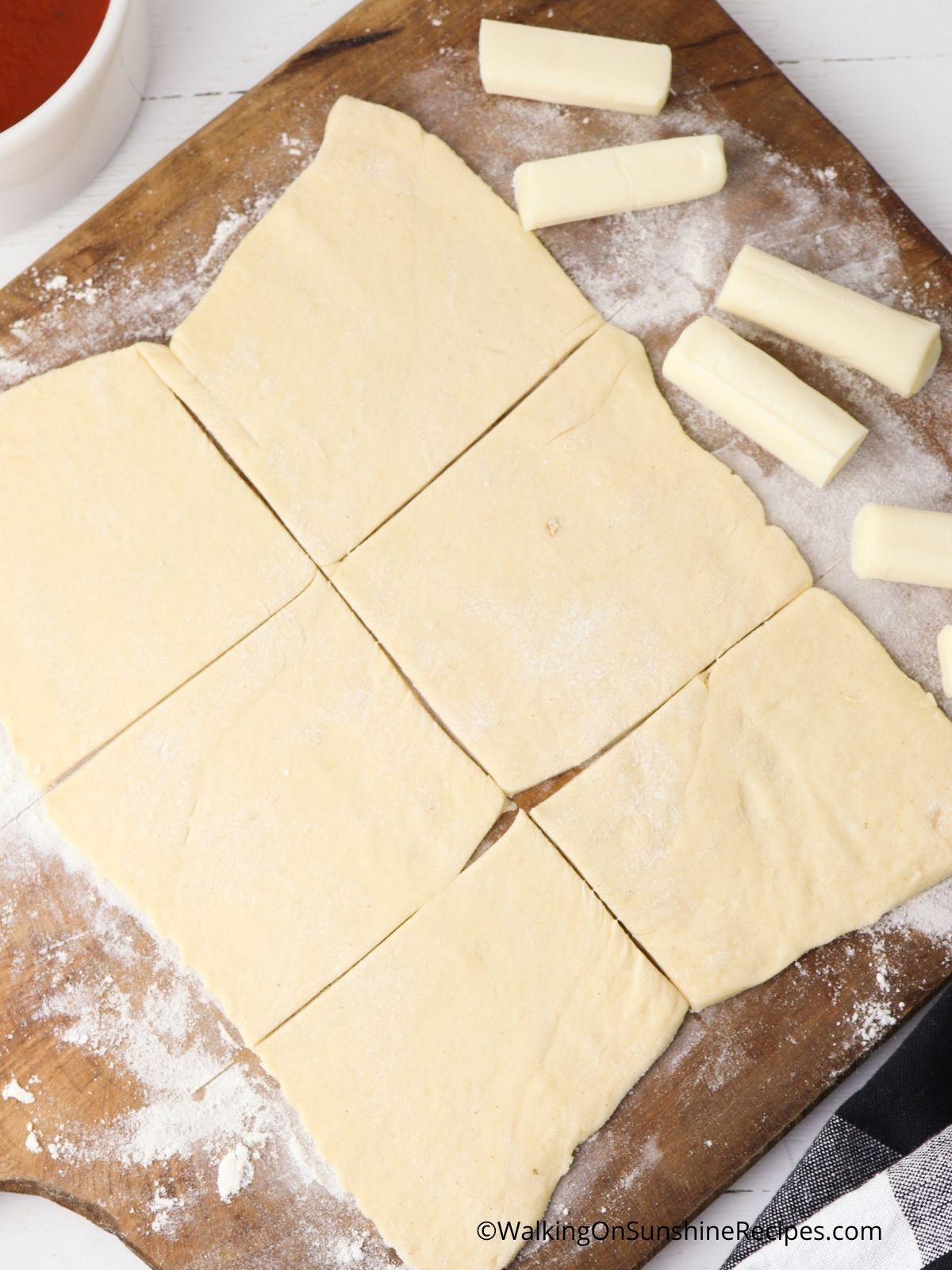 Press out crescent rolls.