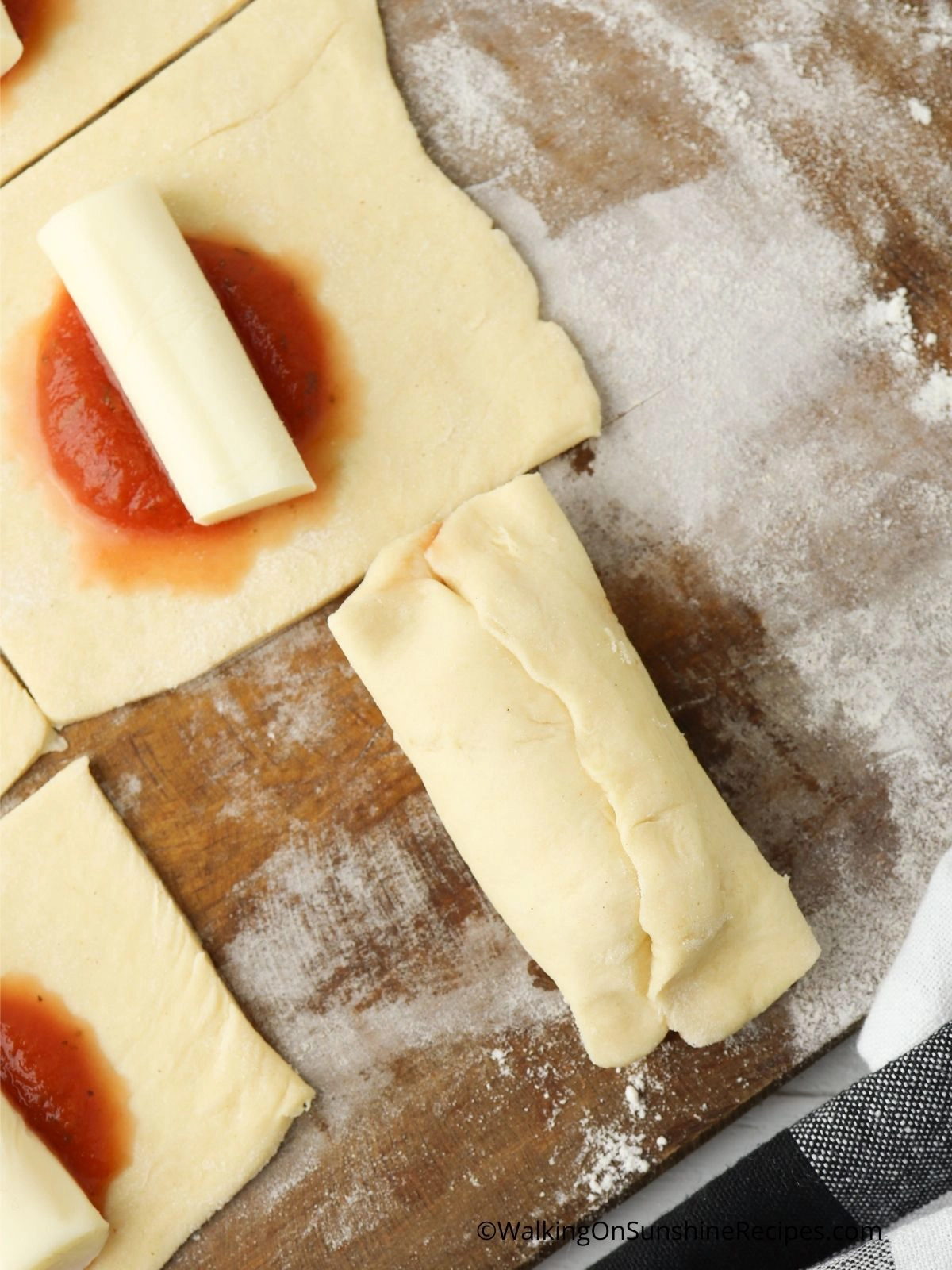 Roll up crescent rolls with cheese.
