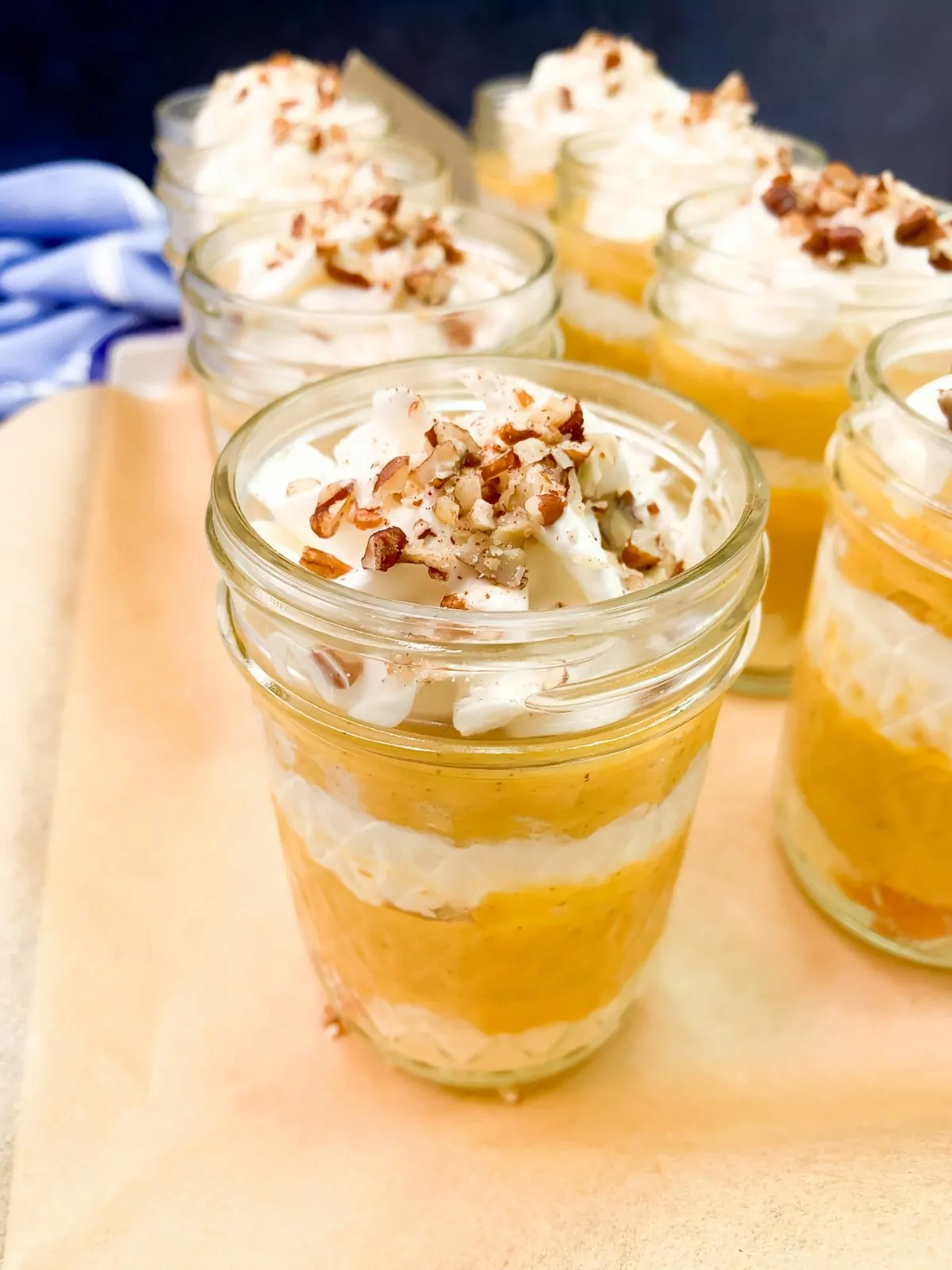 layered pumpkin dessert in a small mason jar