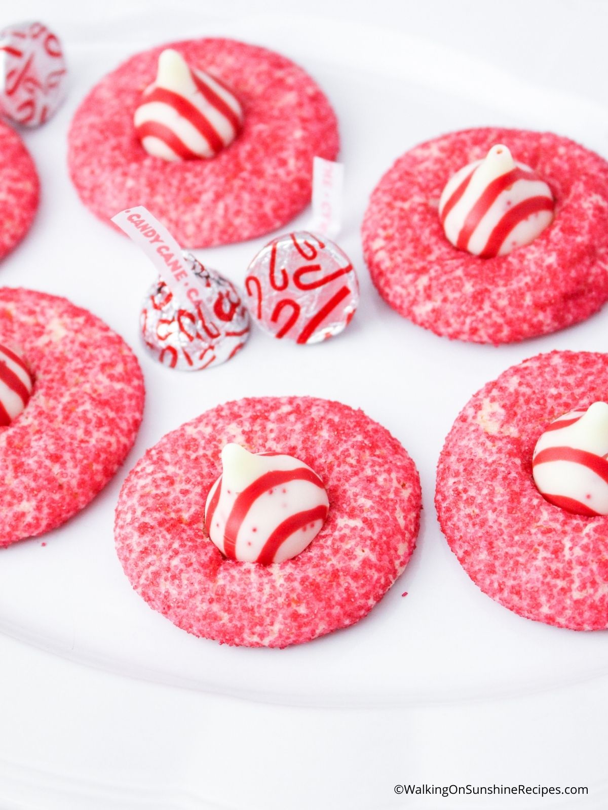 Peppermint Blossom Cookies with Hershey Kiss and red sugar.