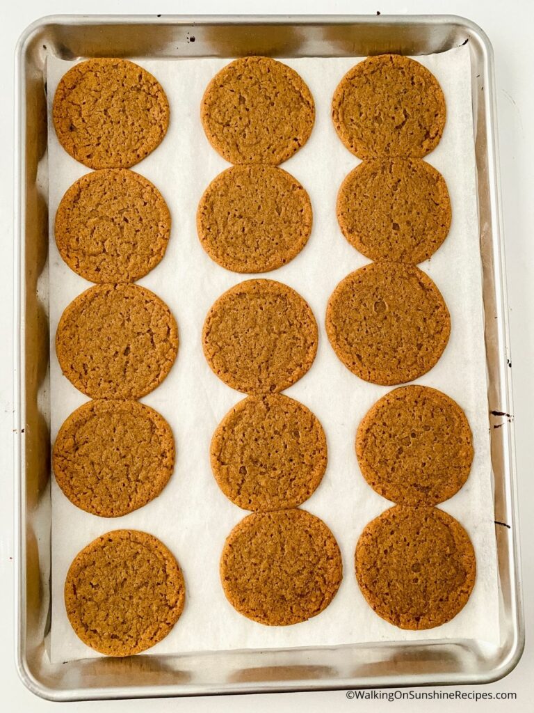 Gingersnap cookies on baking tray.