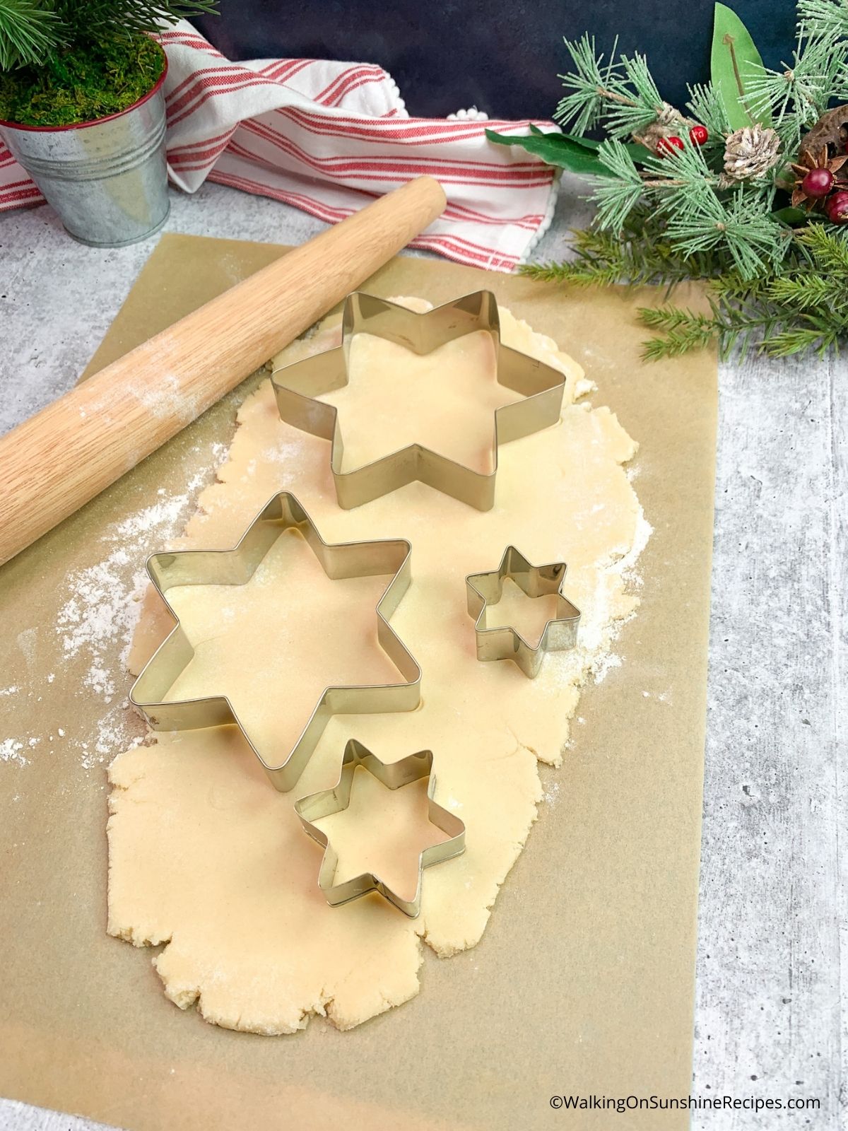 cut shapes of Christmas trees in the dough.