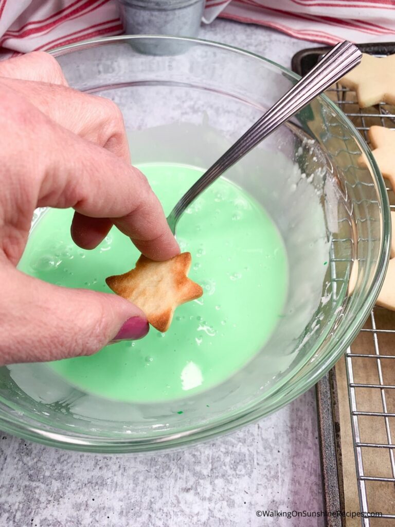dip cookies in green icing.