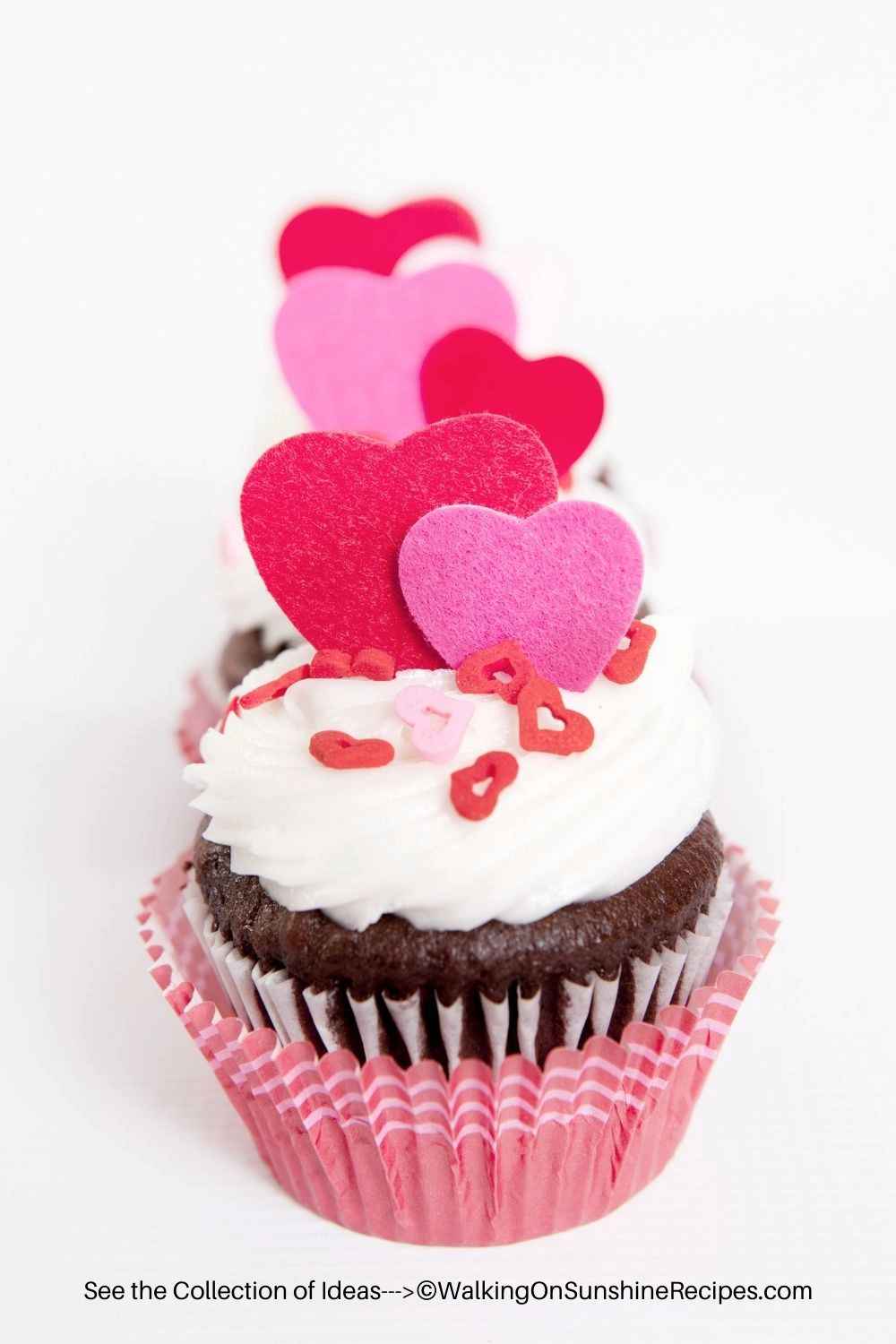 Chocolate cupcake with heart shaped toppings. 