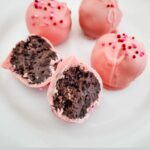 Oreo truffle cut open and decorated.