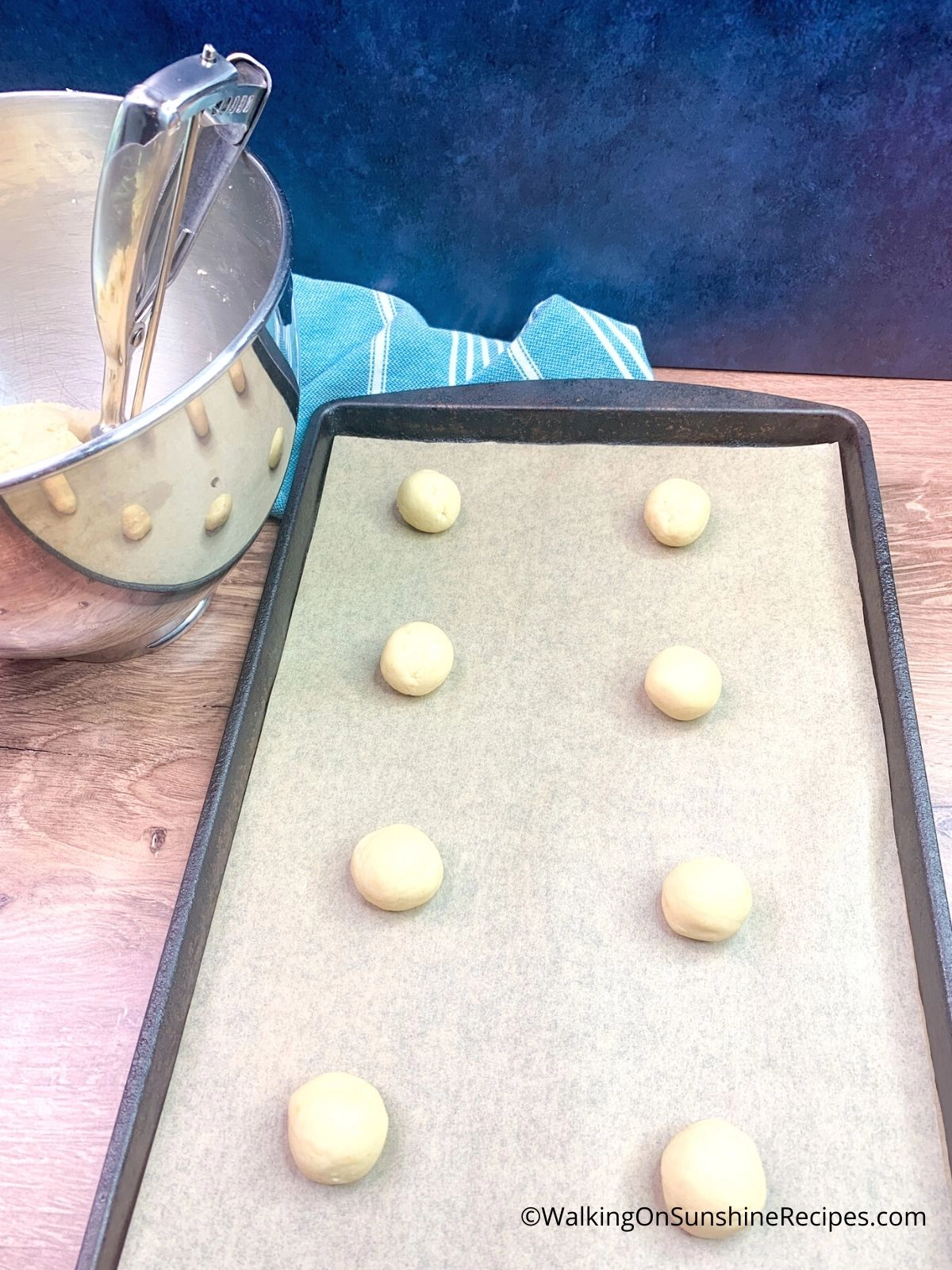 cookies on baking tray with parchment paper. 