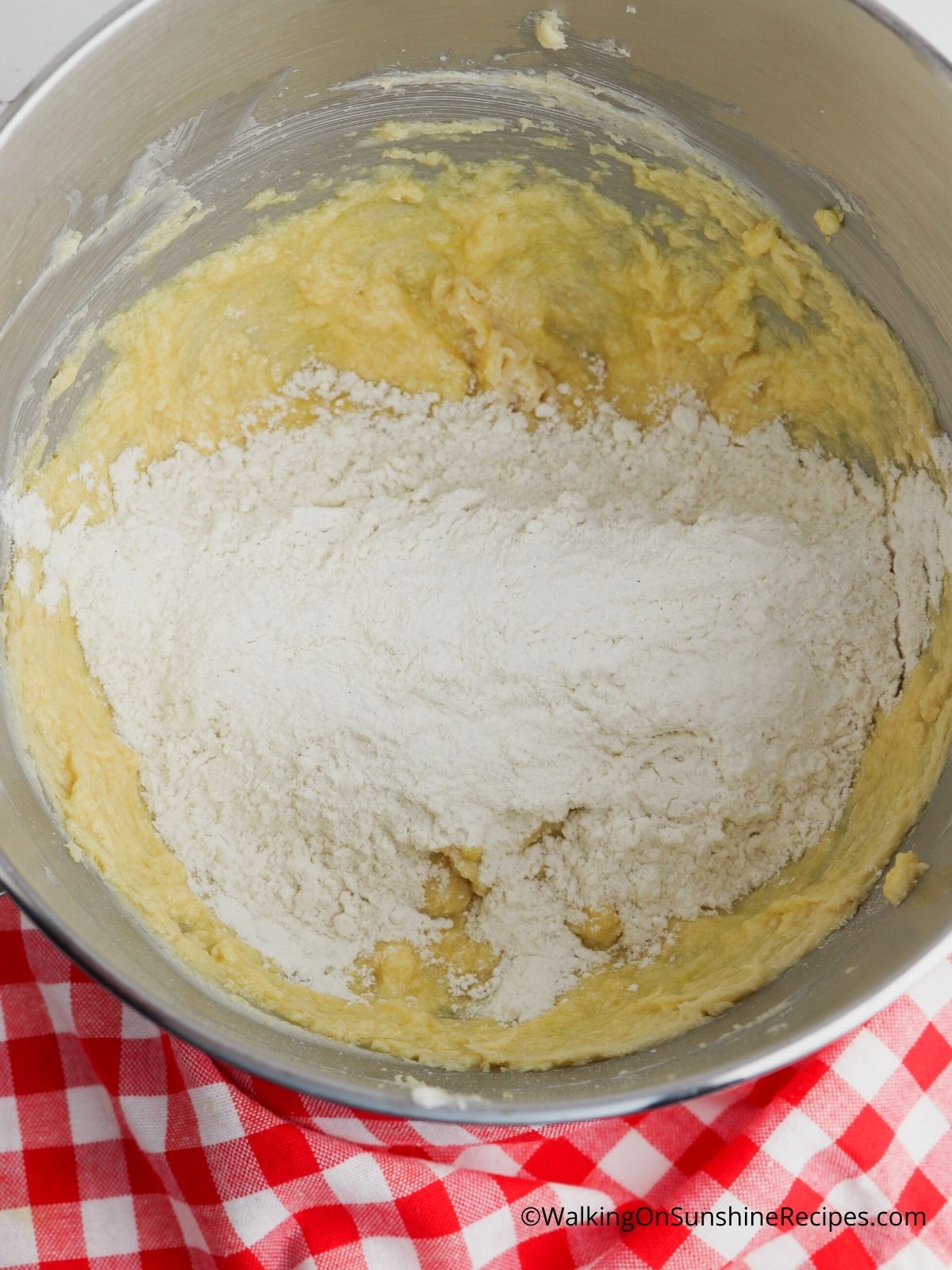 Add flour mixture to butter and sugar mixture.
