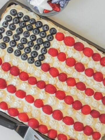 American Flag Sugar Cookie Pizza with blueberries and raspberries