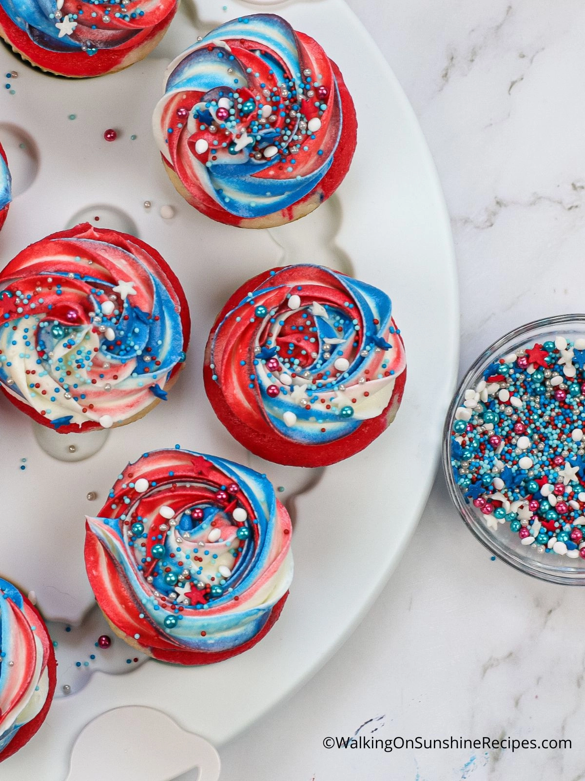 patriotic cupcakes with sprinkles. 