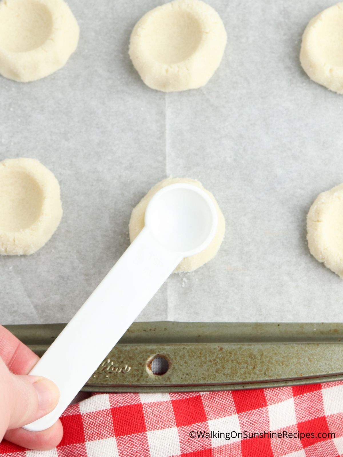 How to make a thumbprint in cookie dough.