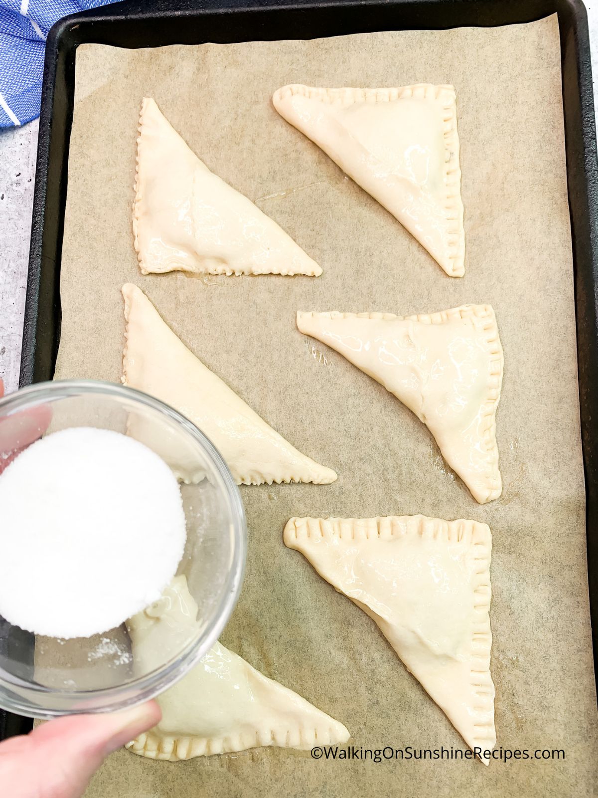 Dust turnovers with sugar before baking.