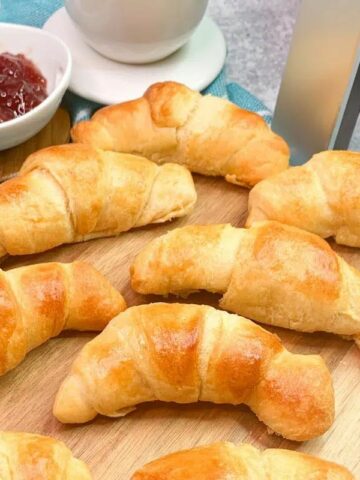 Croissants on a board.
