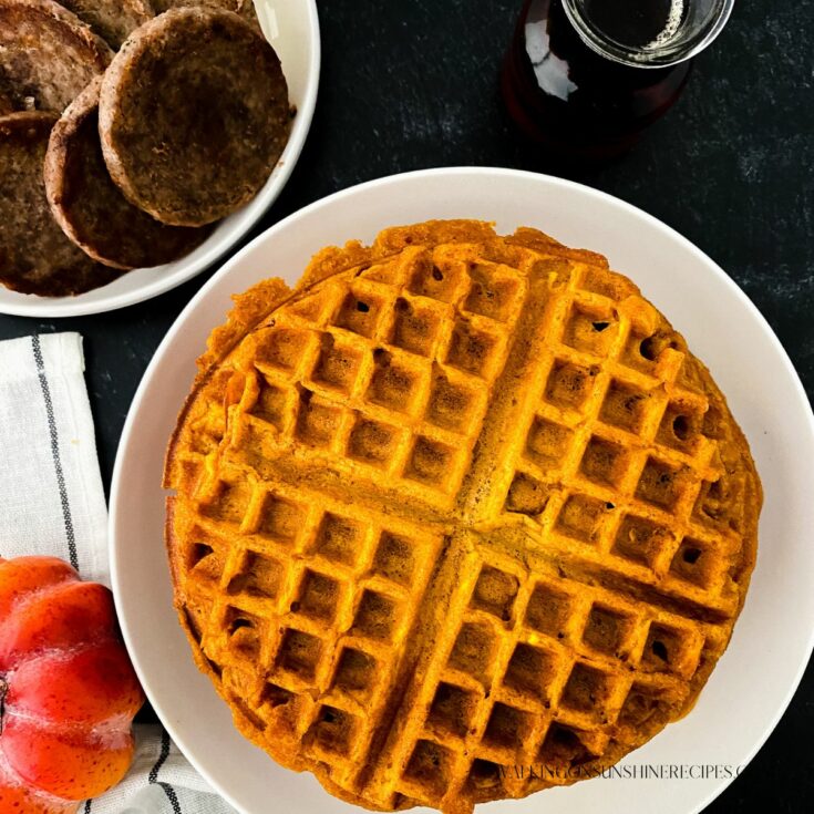 Homemade pumpkin waffle on a white plate