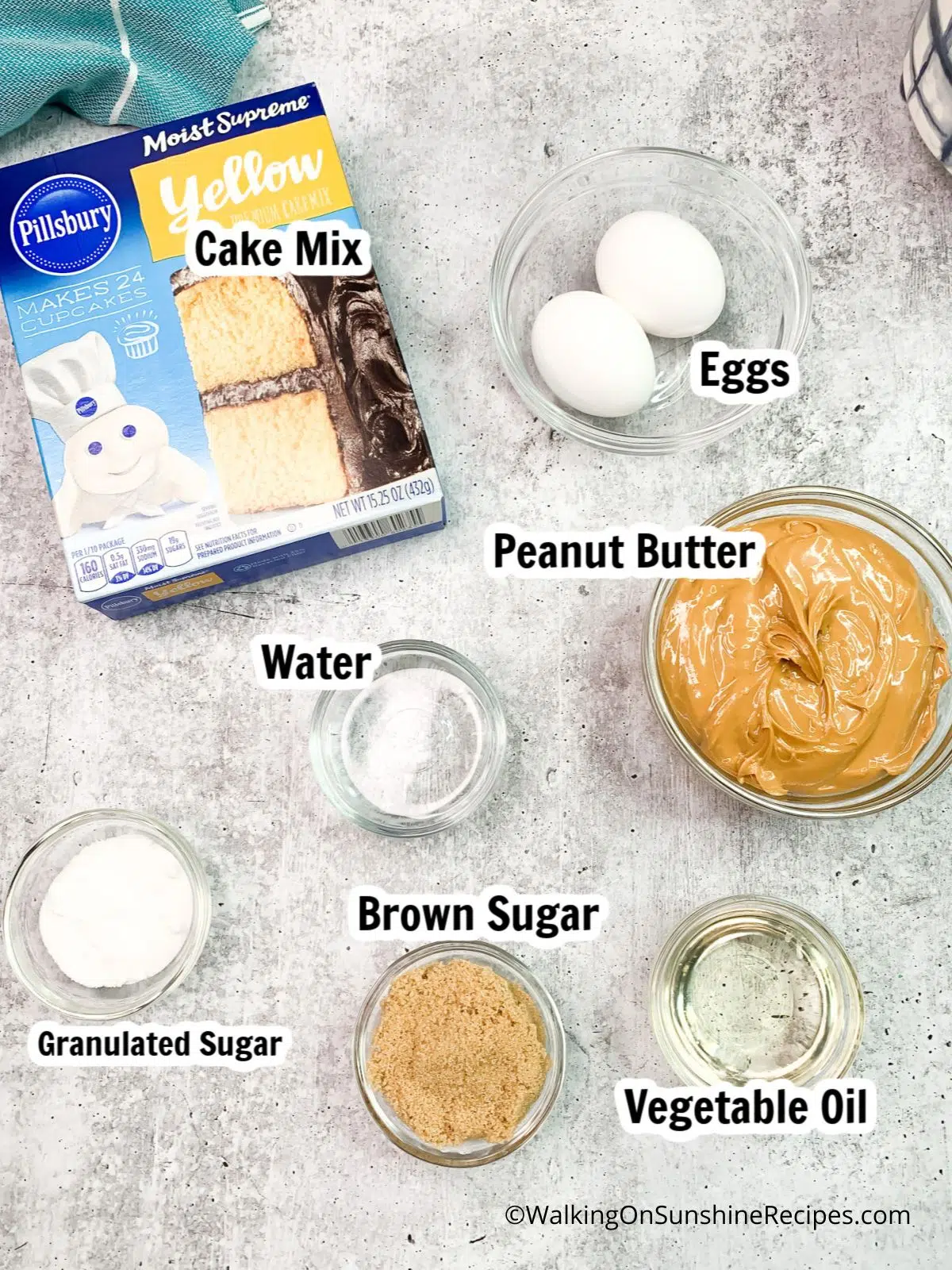 Ingredients needed to make cake mix cookies with peanut butter.