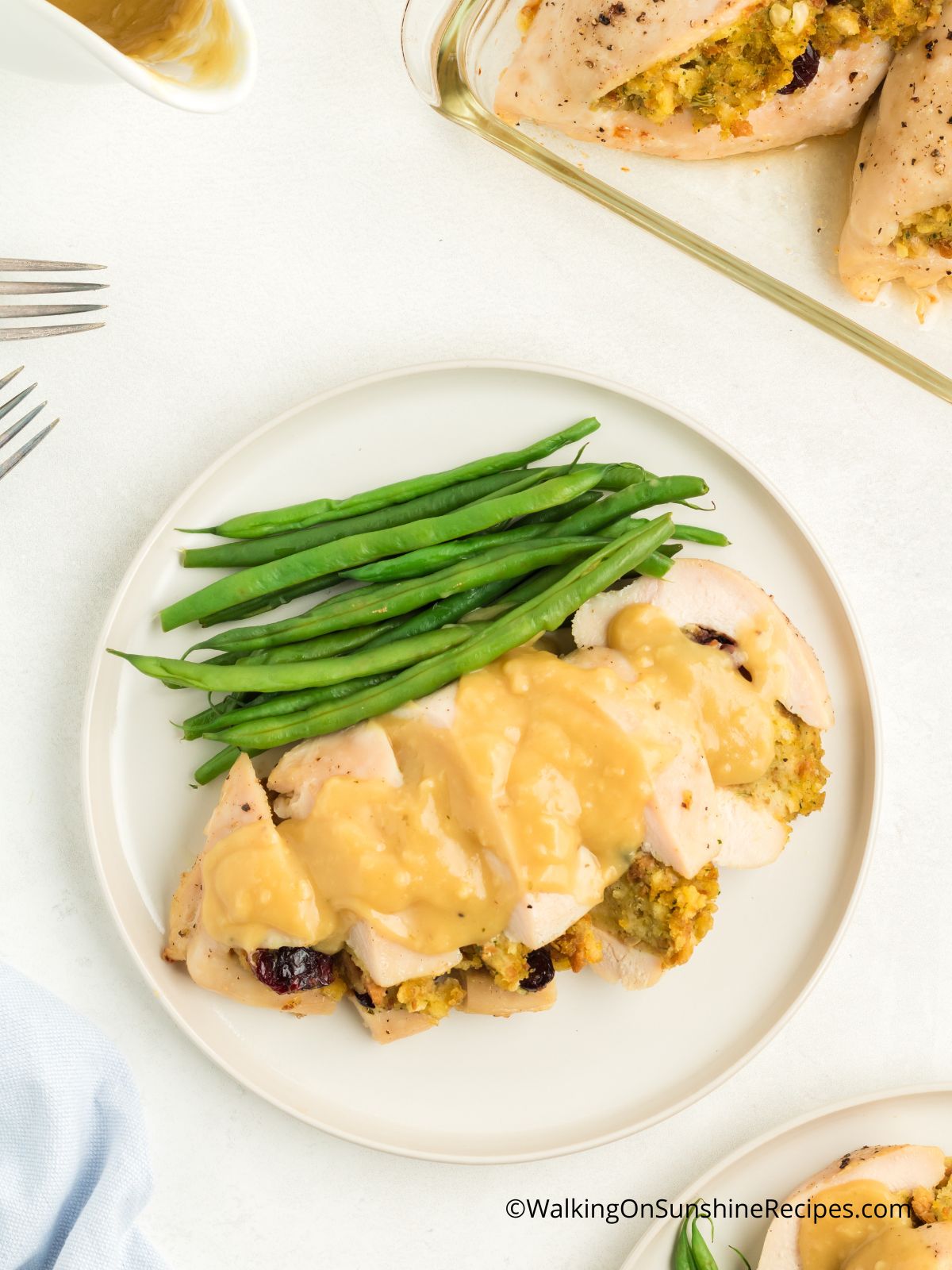 stuffed chicken breast with stuffing and gravy.