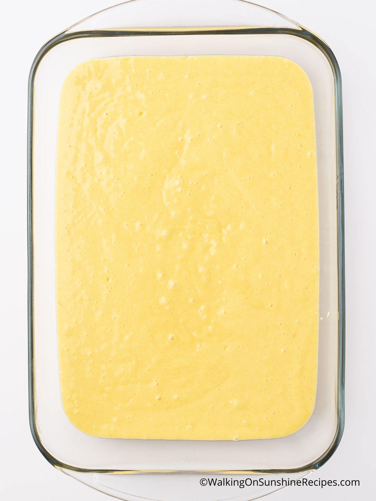 vanilla cake mix in baking pan.