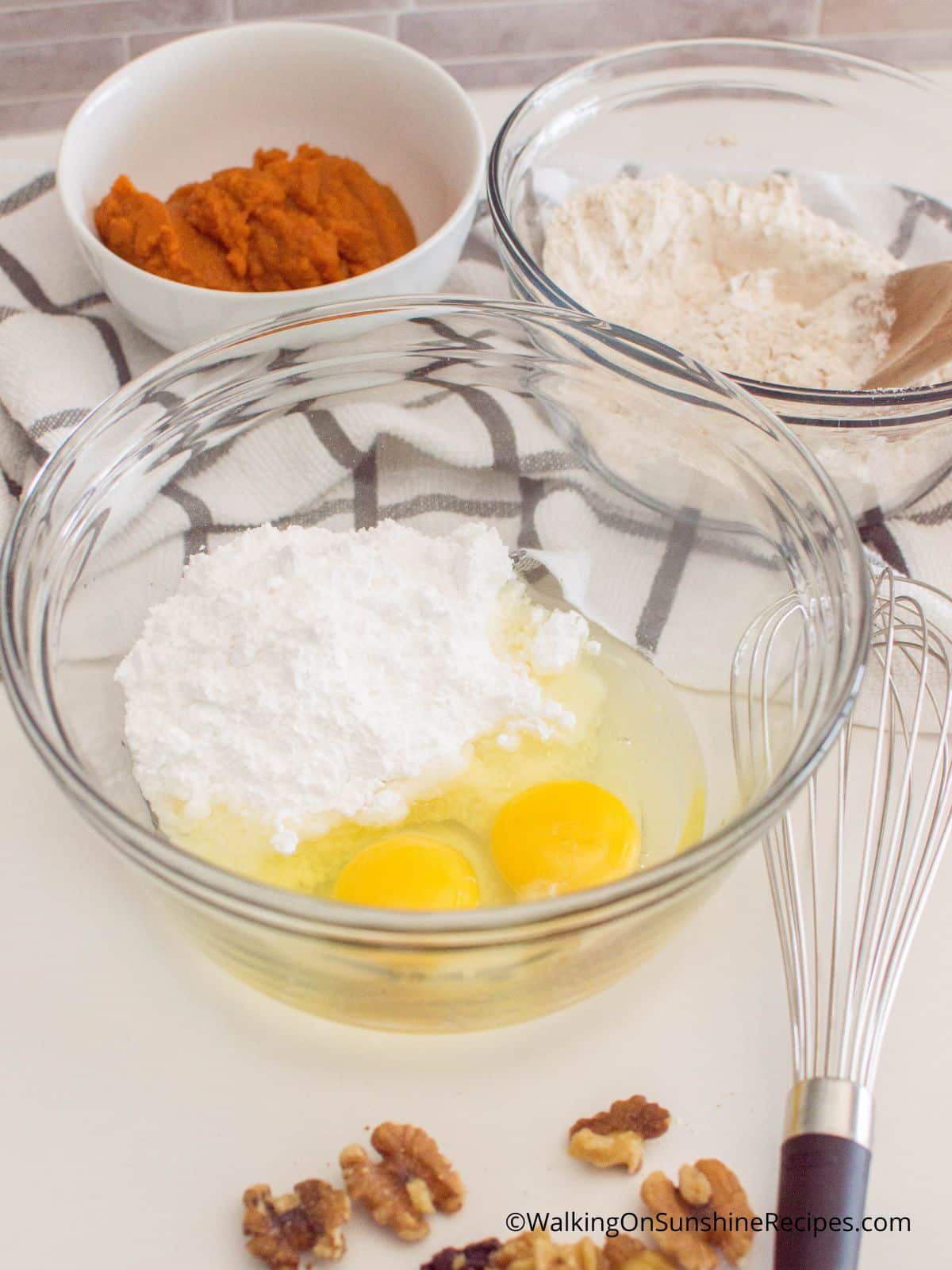 Add eggs to powdered sugar mixture.
