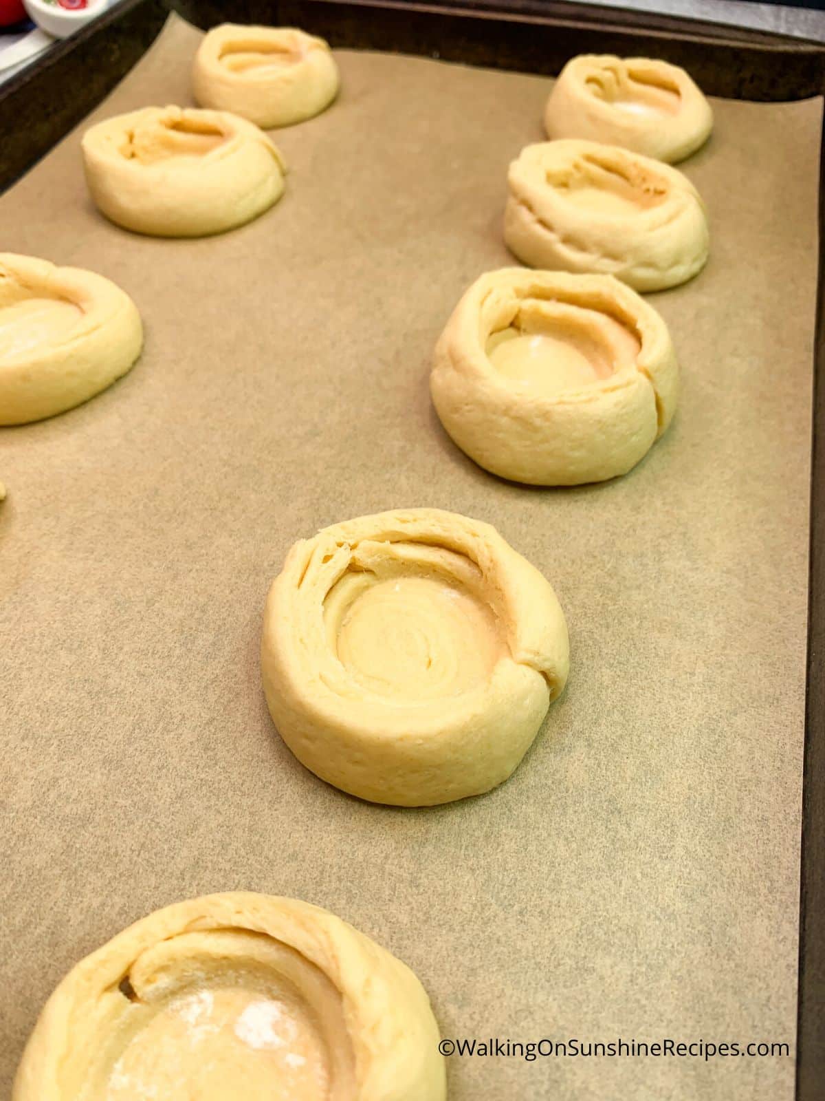 crescent rolls with wells for filling.