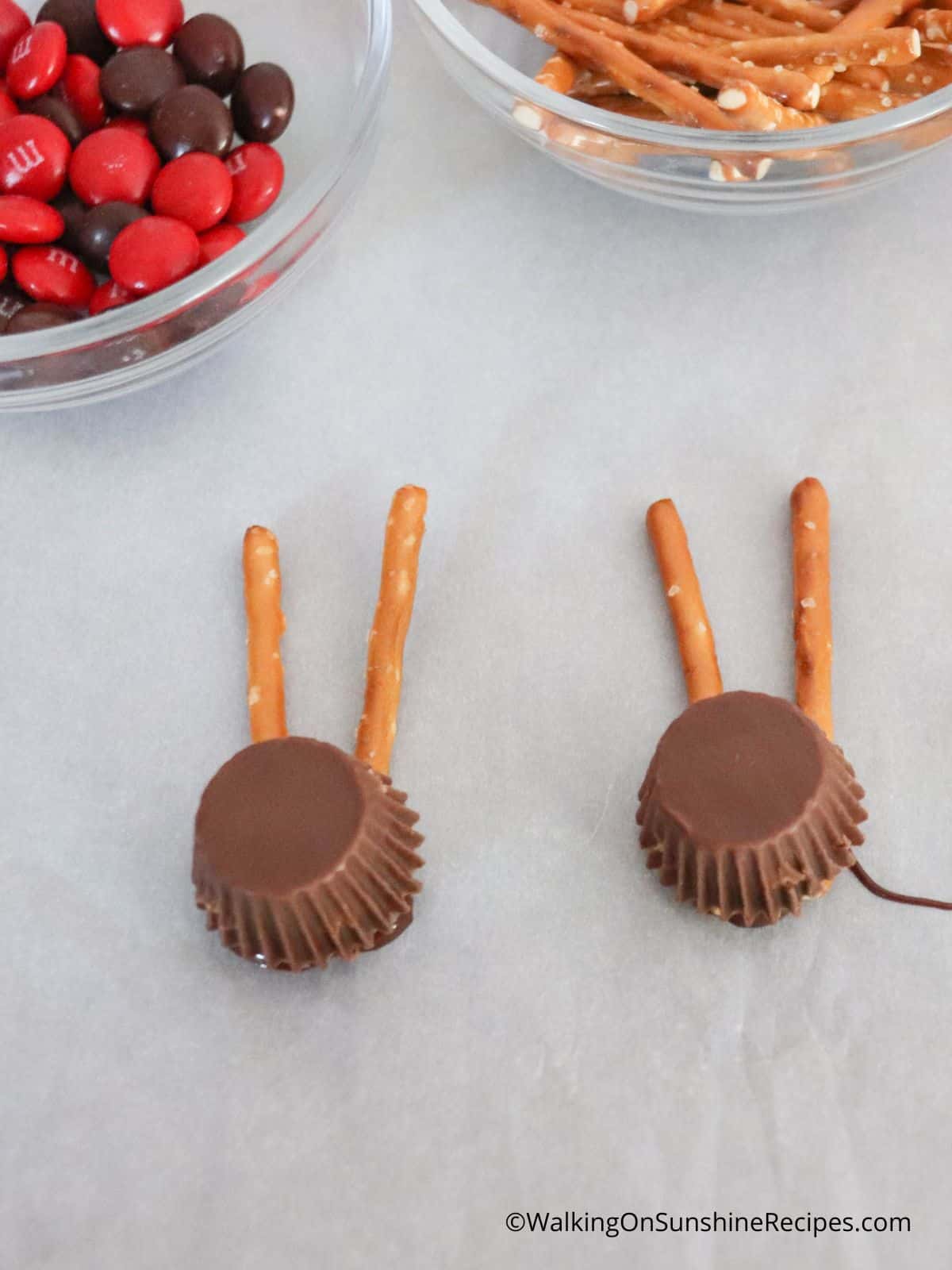 add mini peanut butter cups to pretzel sticks.