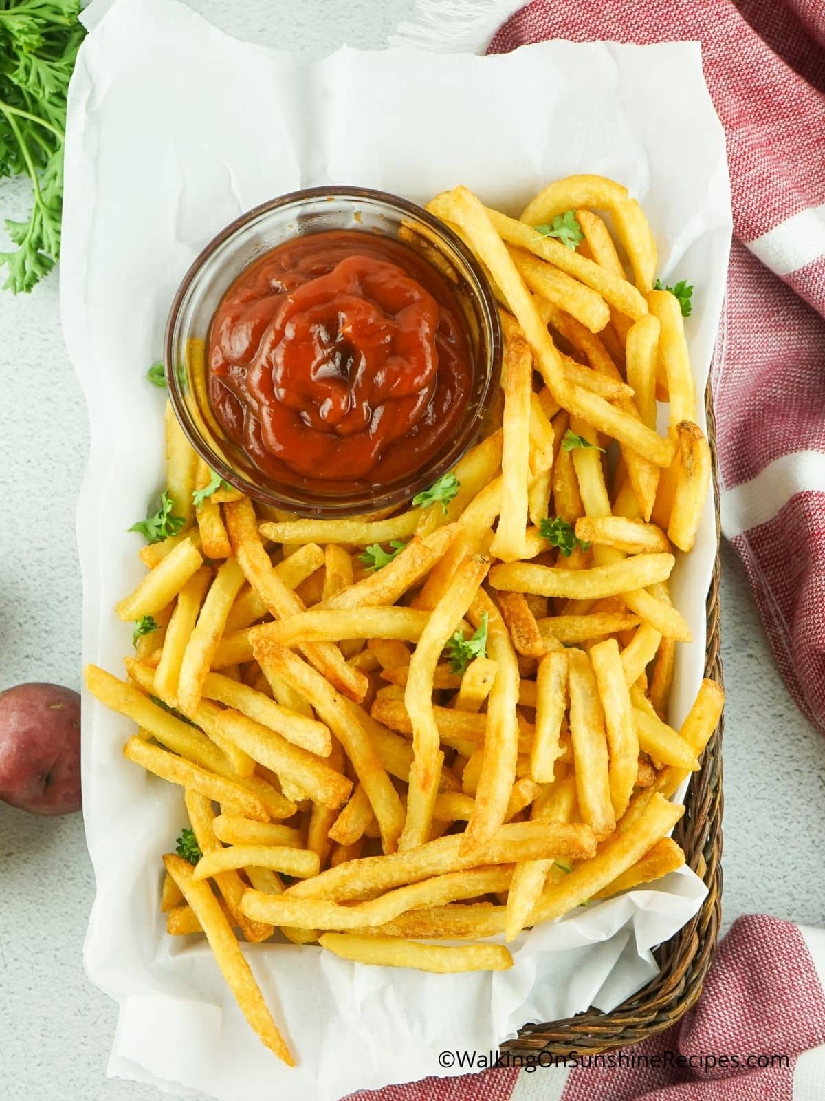French fries with ketchup made extra crispy using an air fryer.