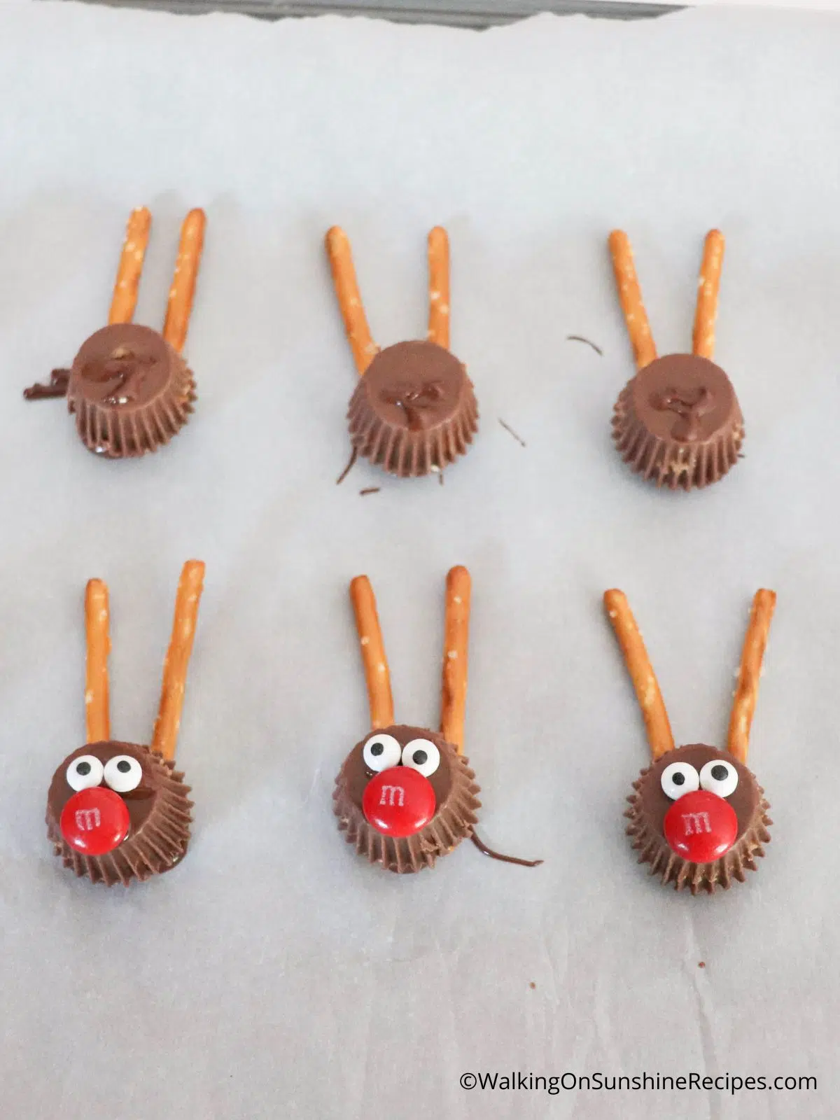 Candy eyes and candy nose on mini peanut butter cups.
