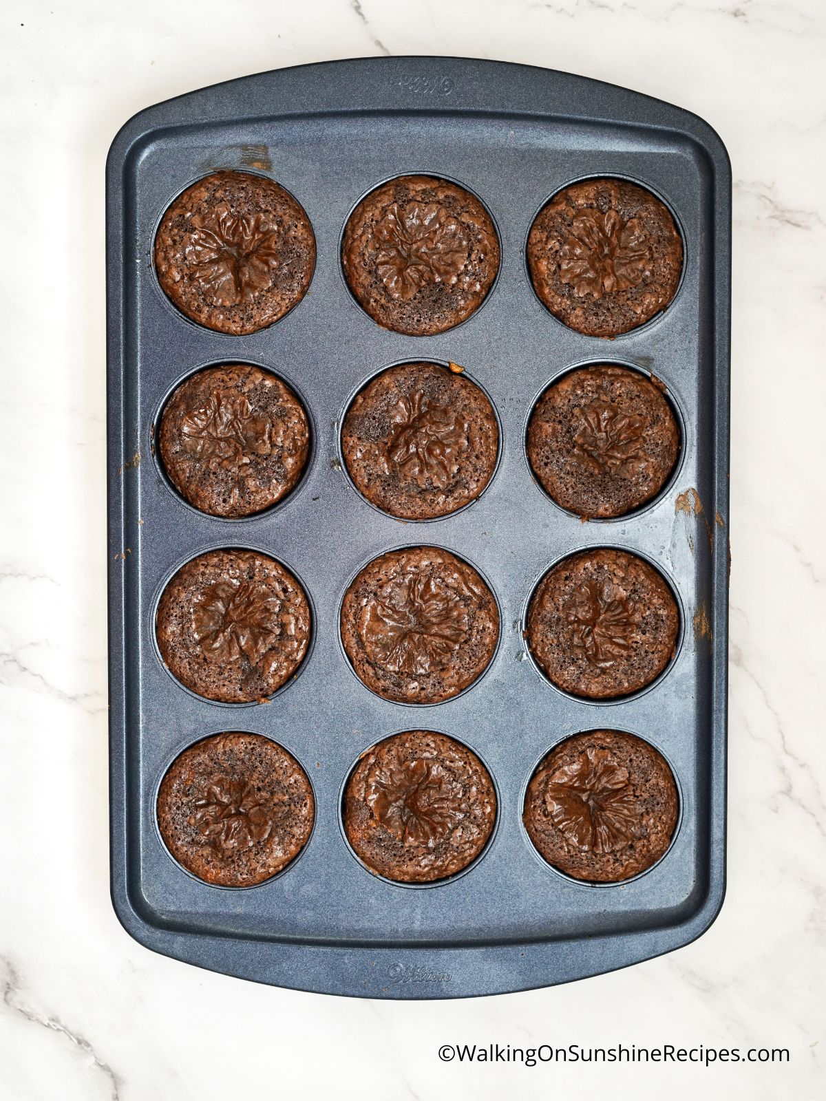 baked brownies in muffin pan.
