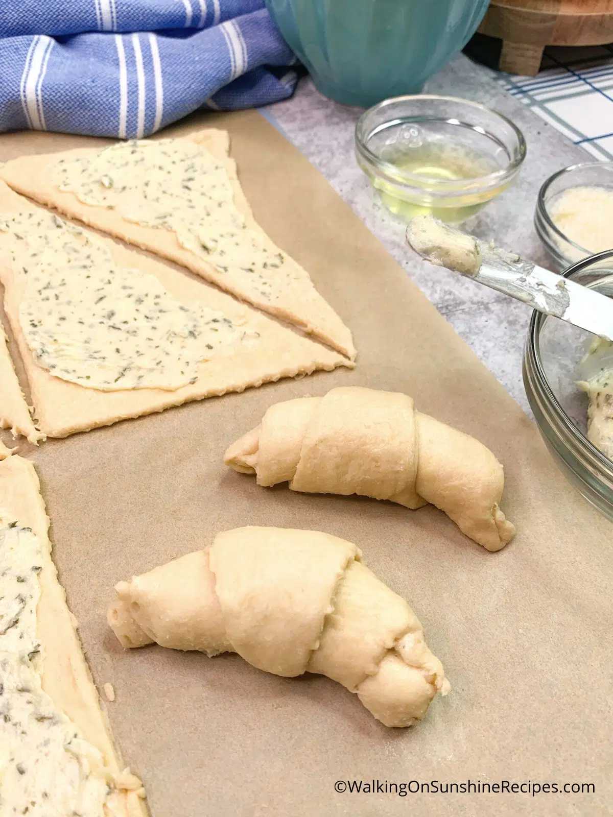 roll up crescent rolls and form into shapes.