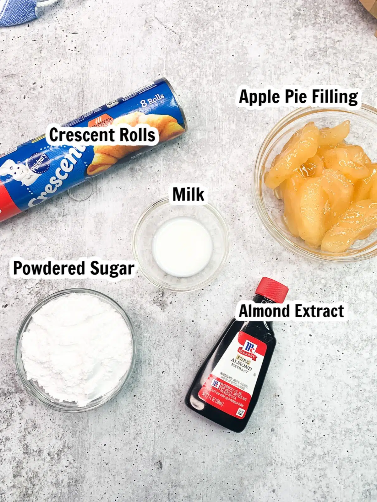 Ingredients crescent rolls, apple pie filling, powdered sugar, almond extract.
