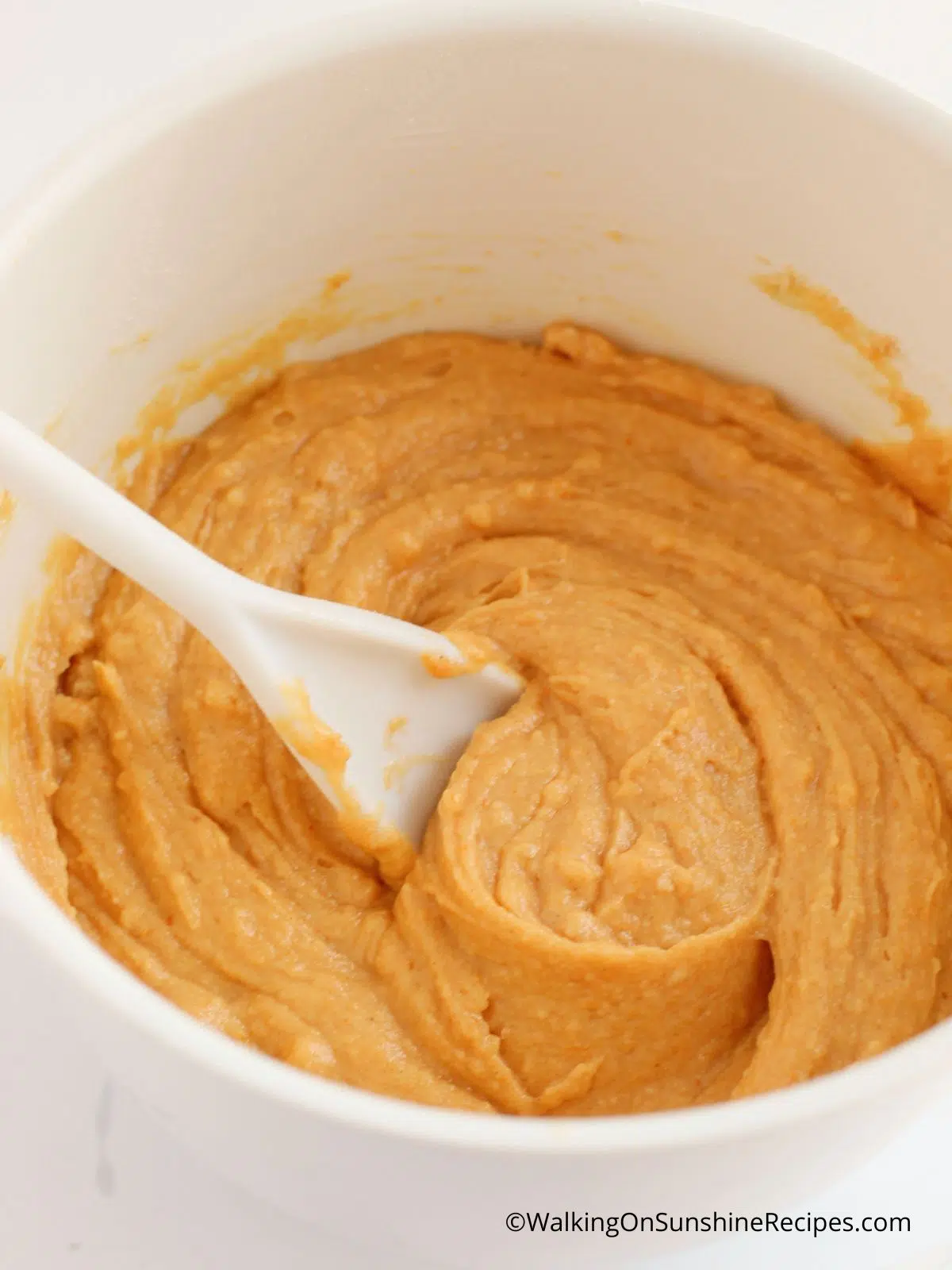 batter for pumpkin coffee cake in mixing bowl.