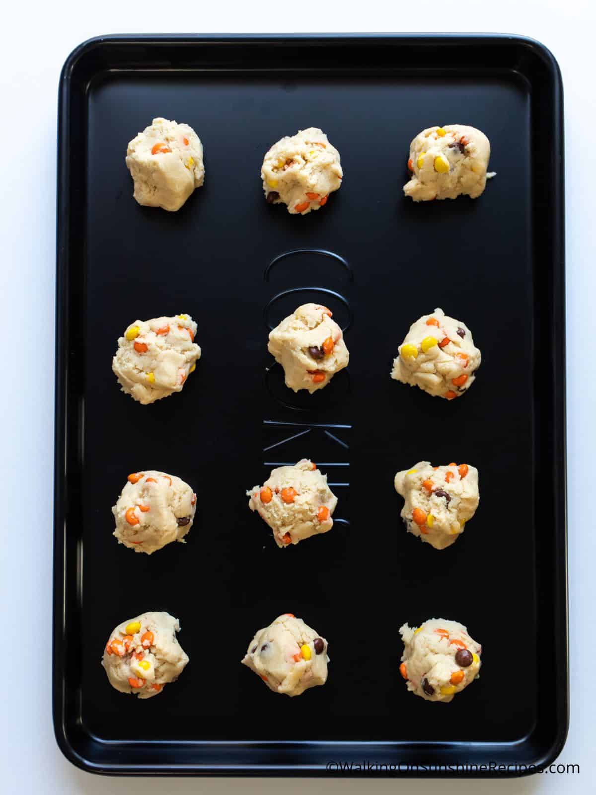 raw cookie dough on baking tray.