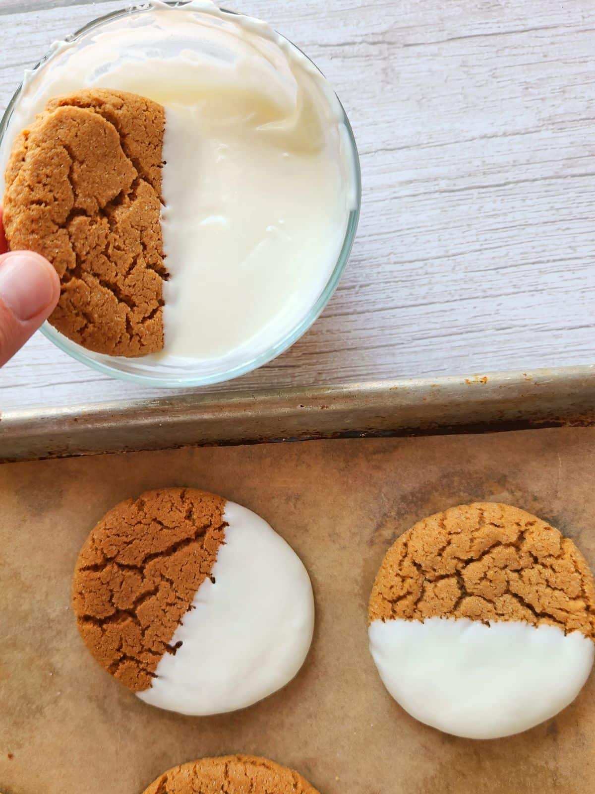 Dip cookies in white icing.