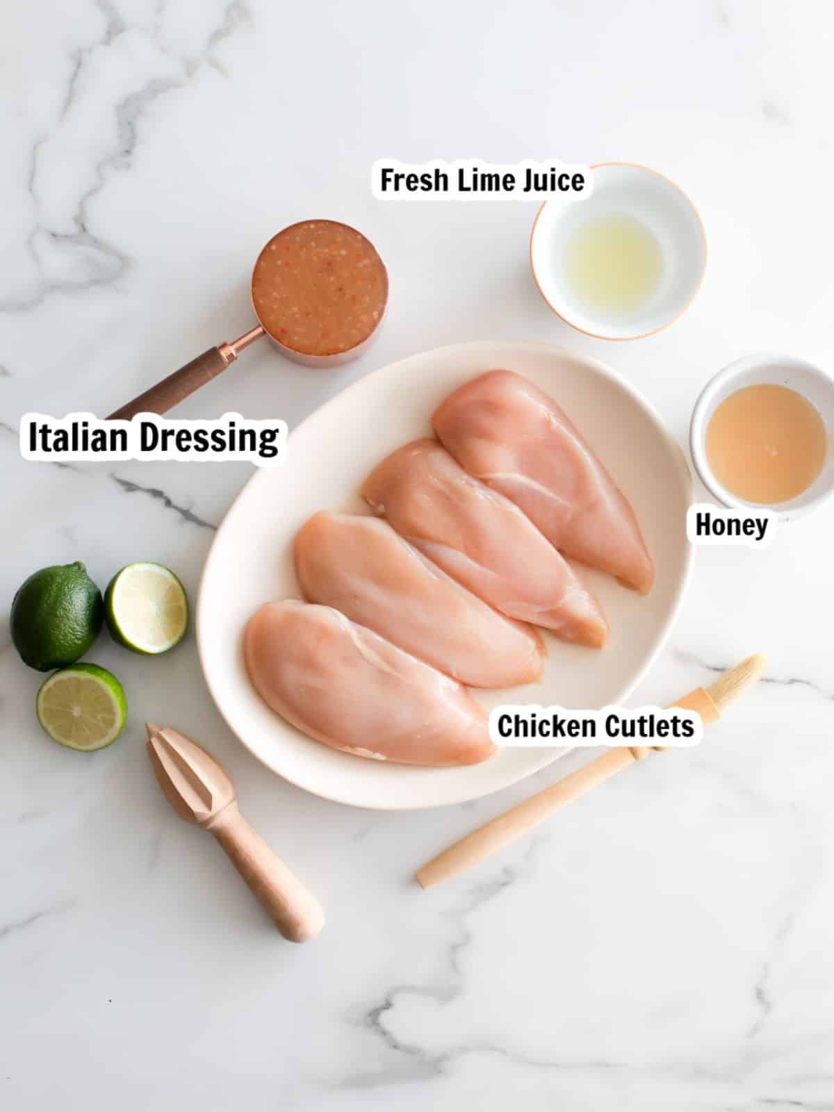 Ingredients for baked chicken cutlets with Italian dressing and honey marinade.