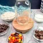 Layer ingredients for mason jar cookie gift in a jar.