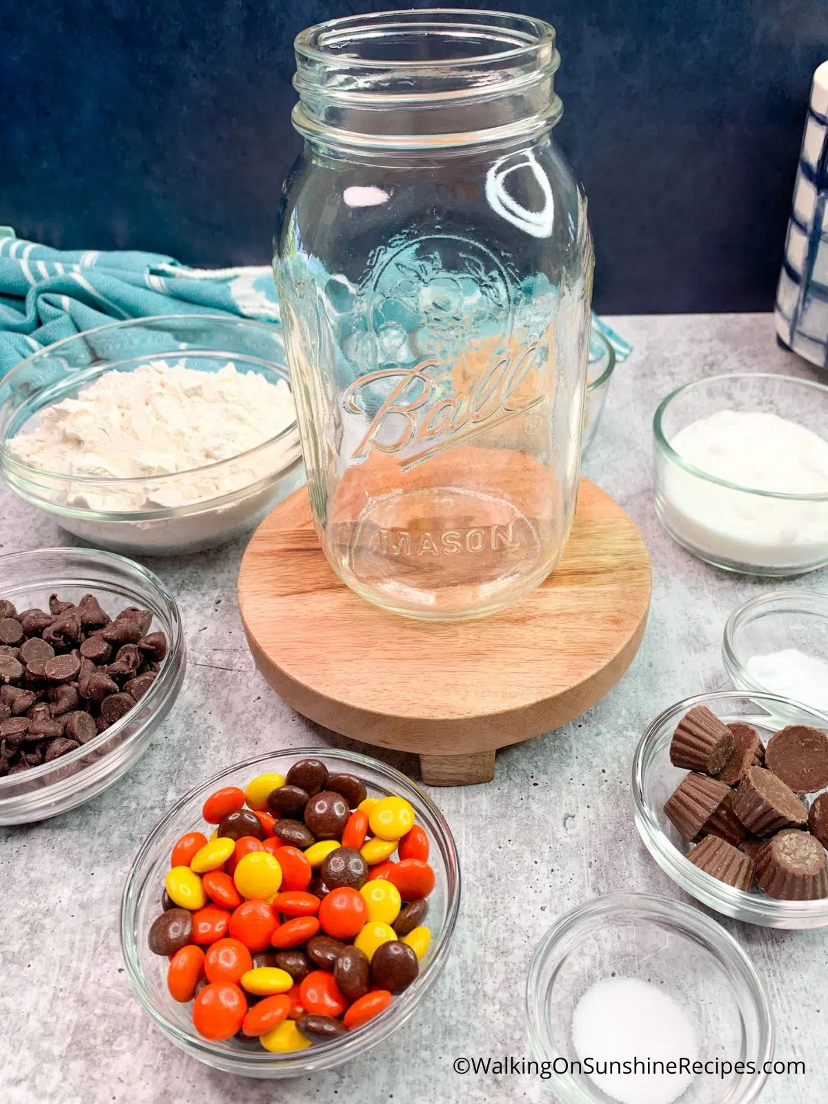 Layer ingredients for mason jar cookie gift in a jar.