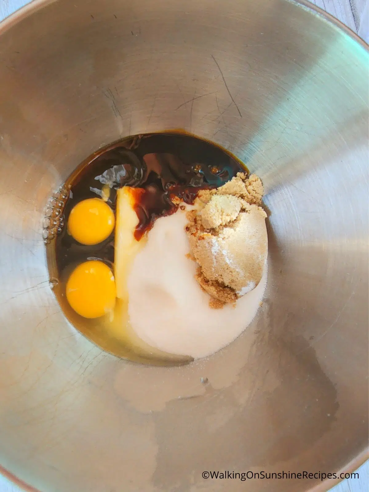 Eggs, molasses, sugar and butter in mixing bowl.