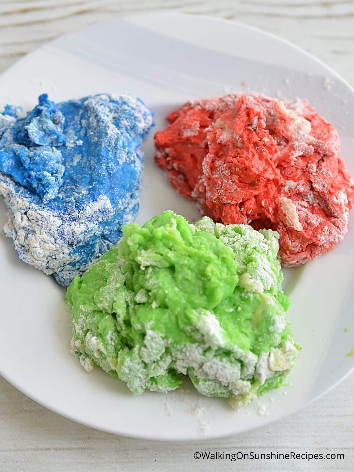 Add food coloring to cake mix cookie batter.
