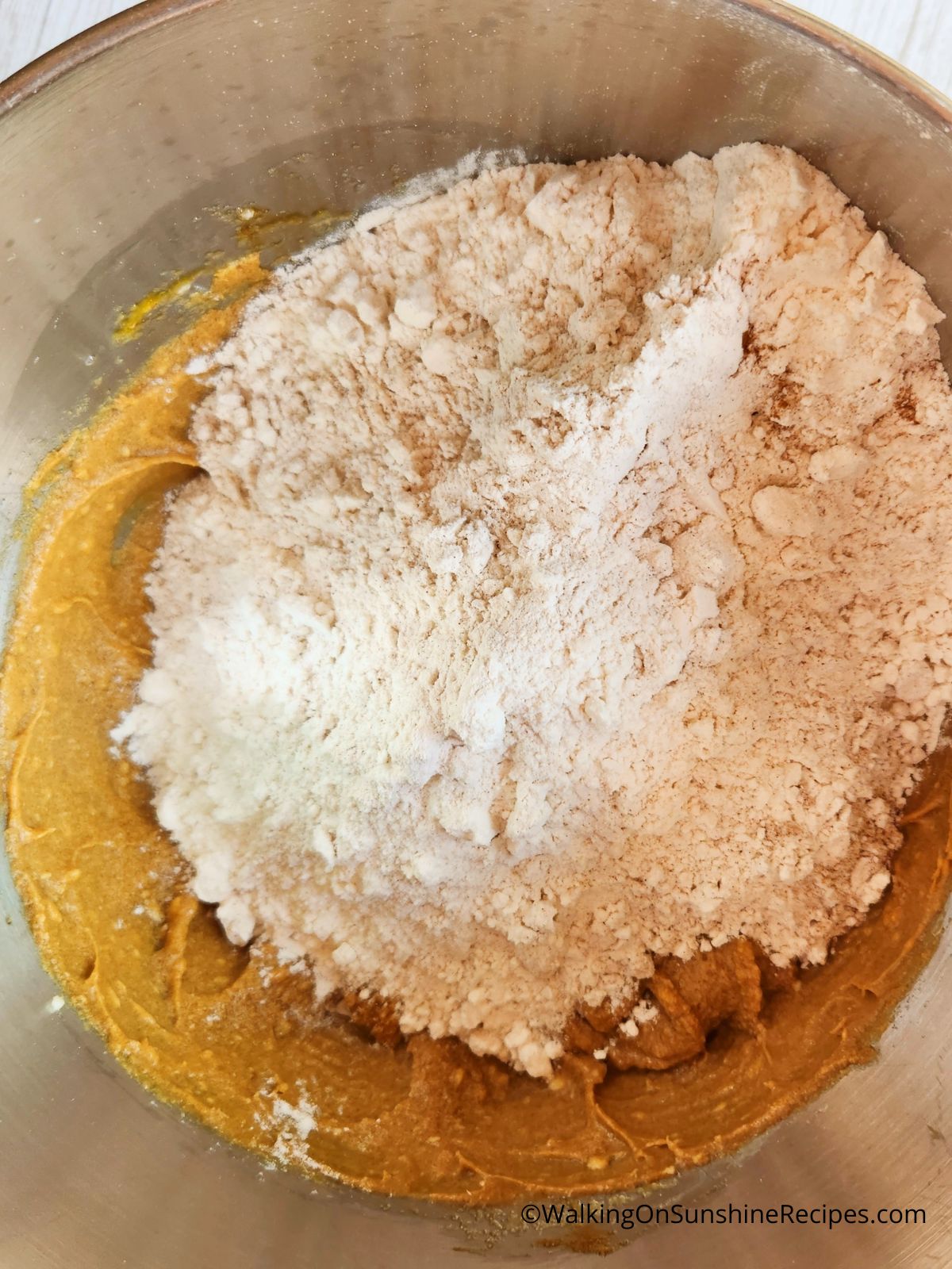 Add flour mixture to wet ingredients.